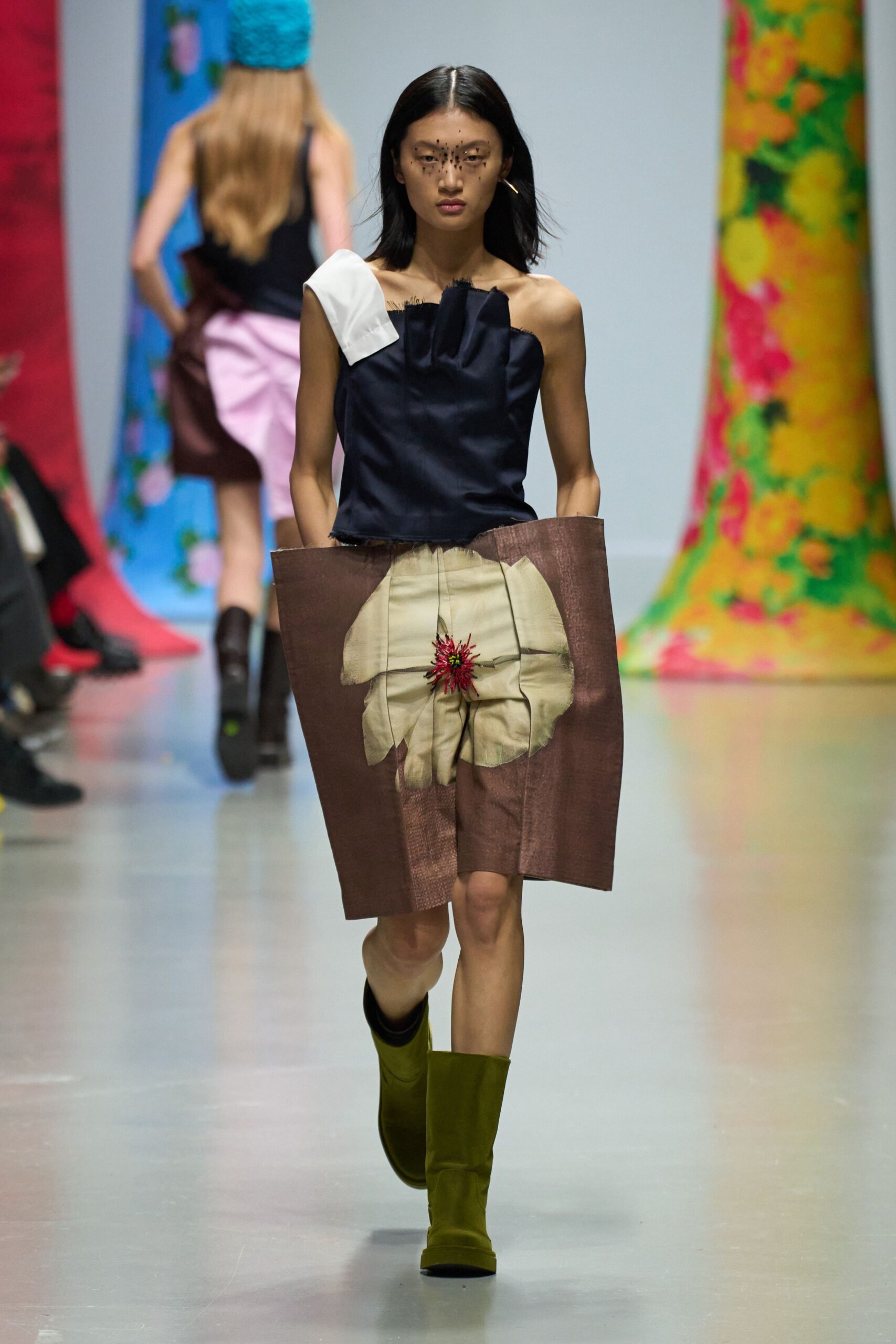 navy top brown pleated skirt green boots
