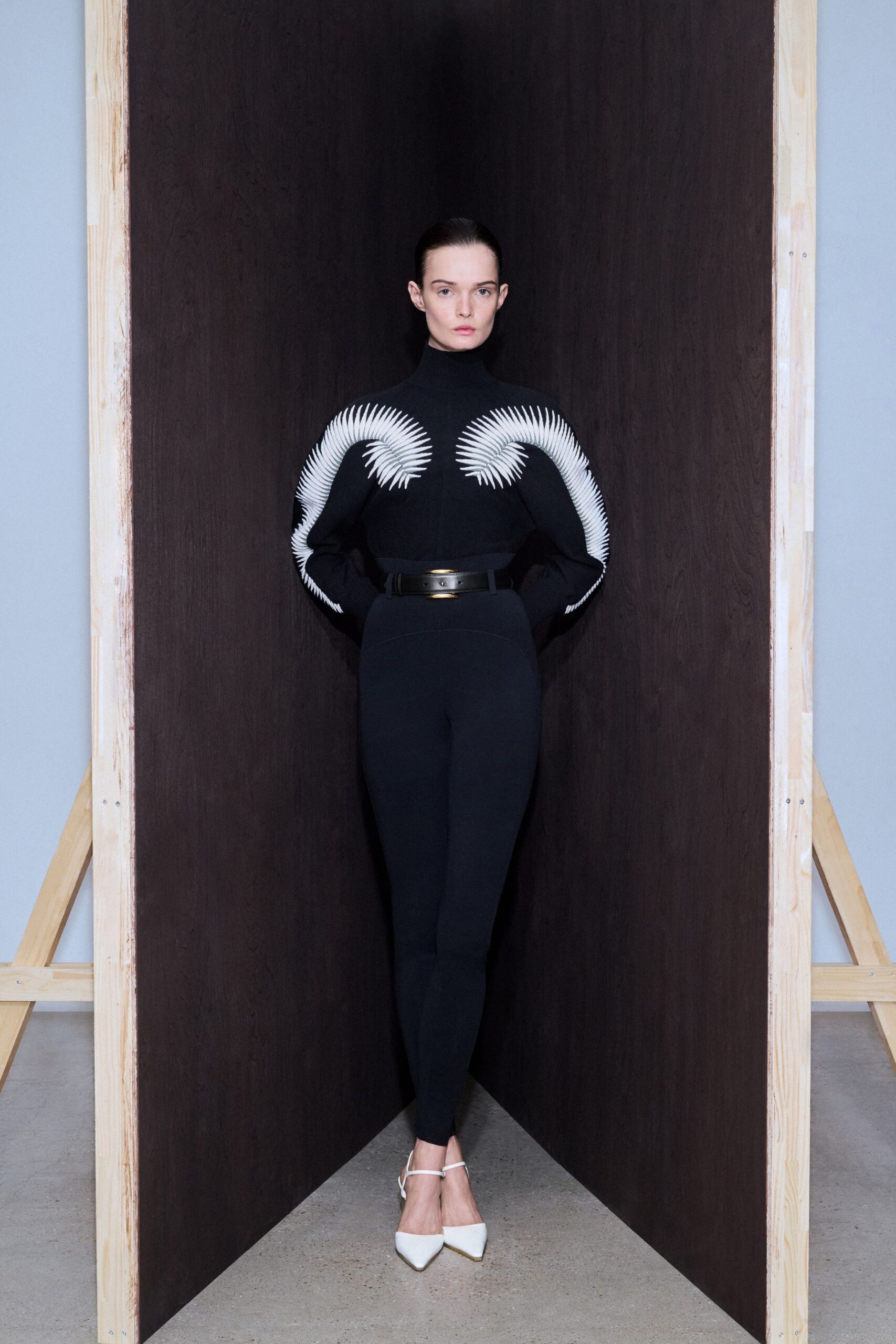 black and white fitted top with pants