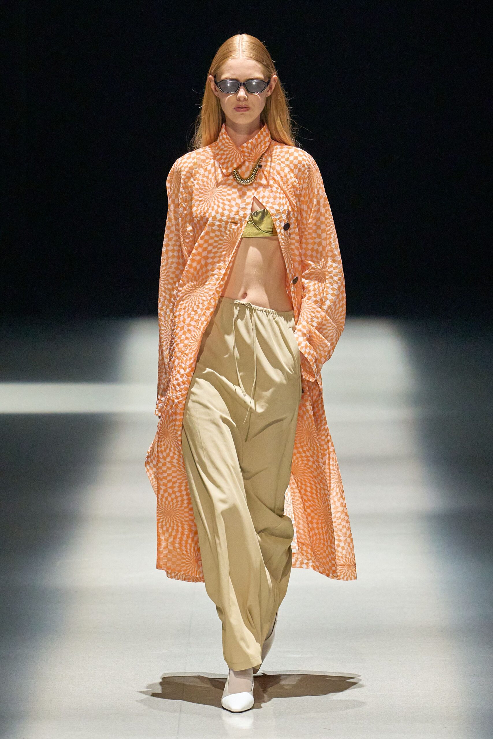 orange printed coat with green top