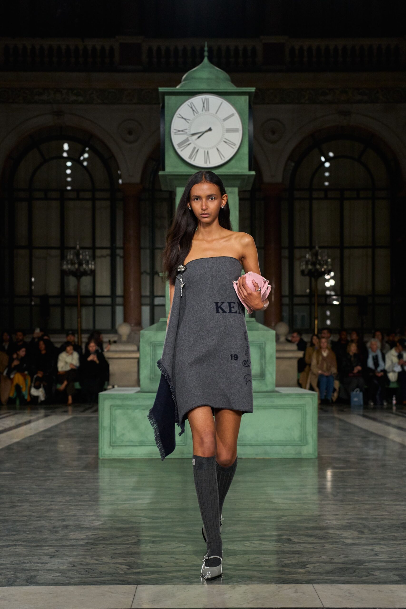 gray strapless mini dress with pink bag