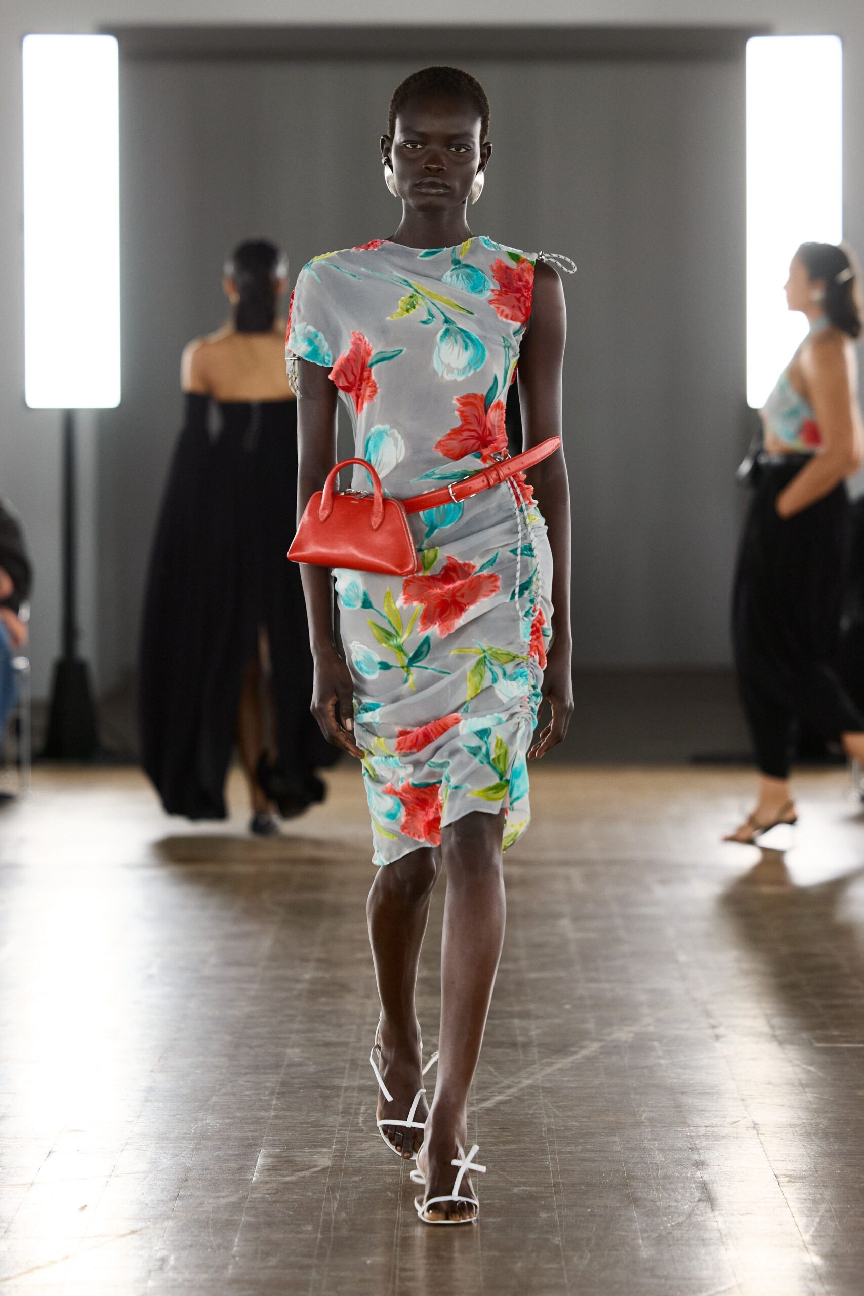 floral midi dress with red bag