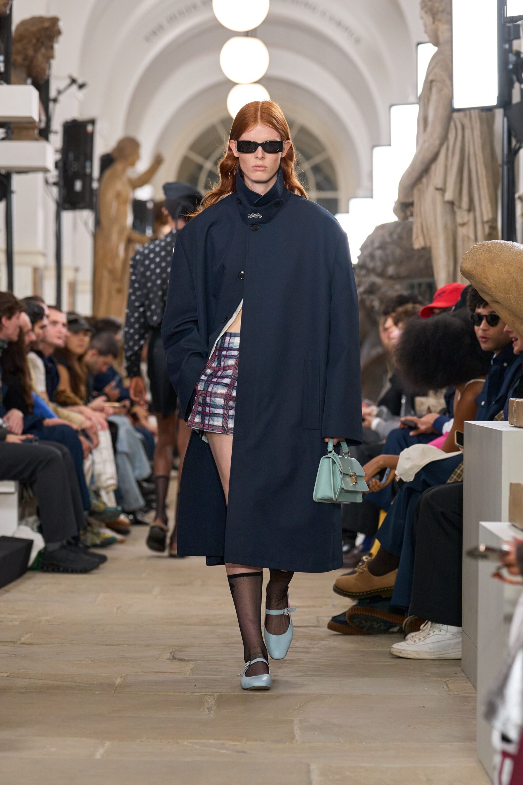 navy coat with plaid skirt