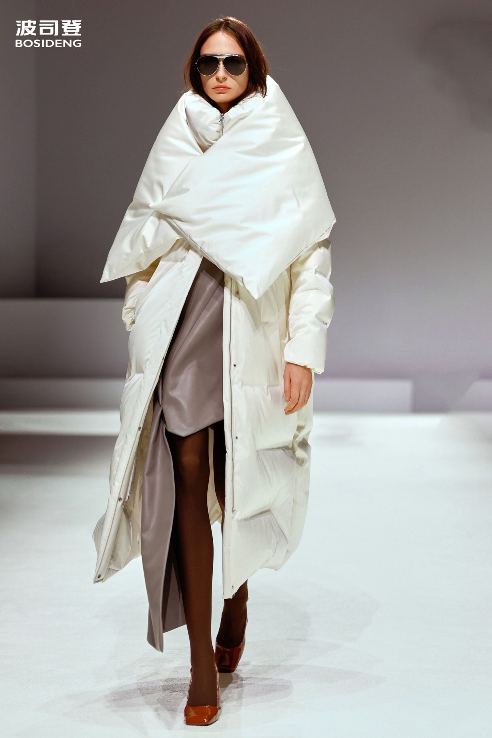white vinyl long-sleeve collared relaxed zippered shiny coat