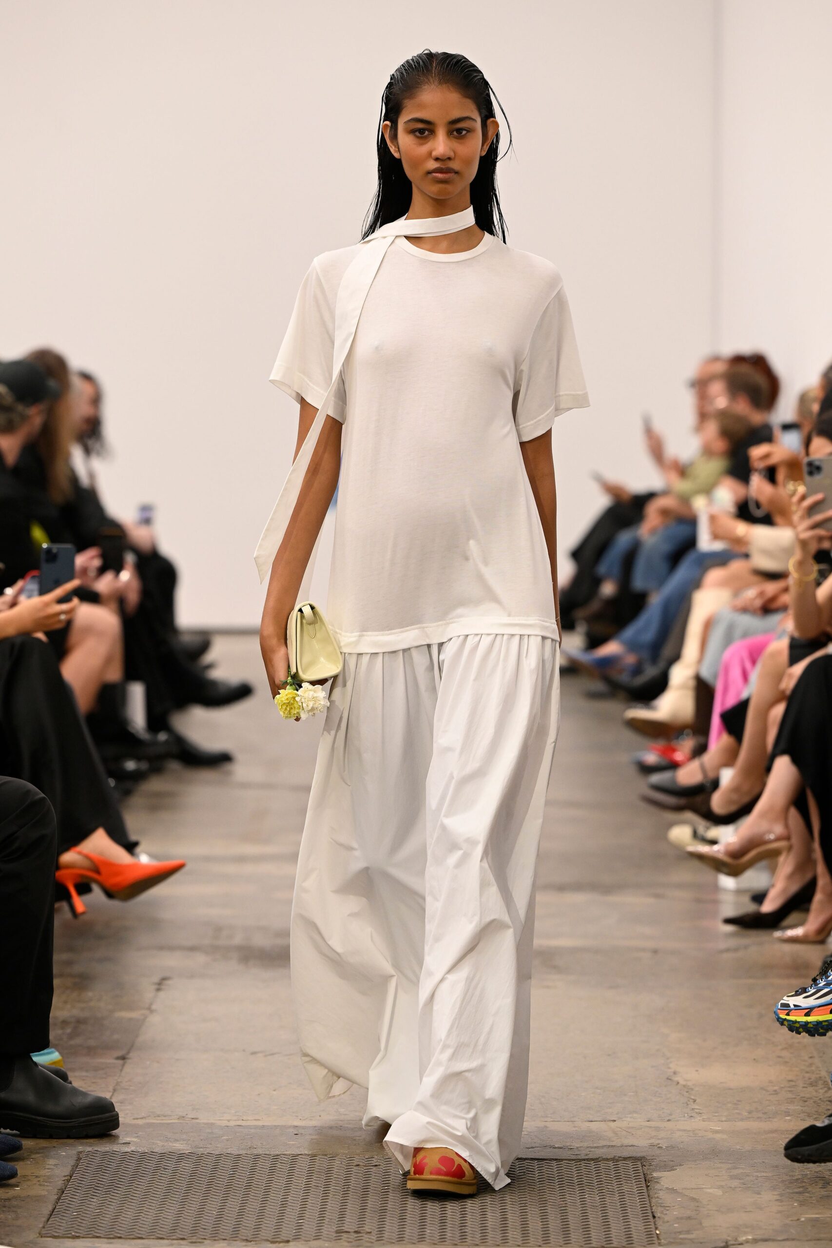 white relaxed top with pleated pants