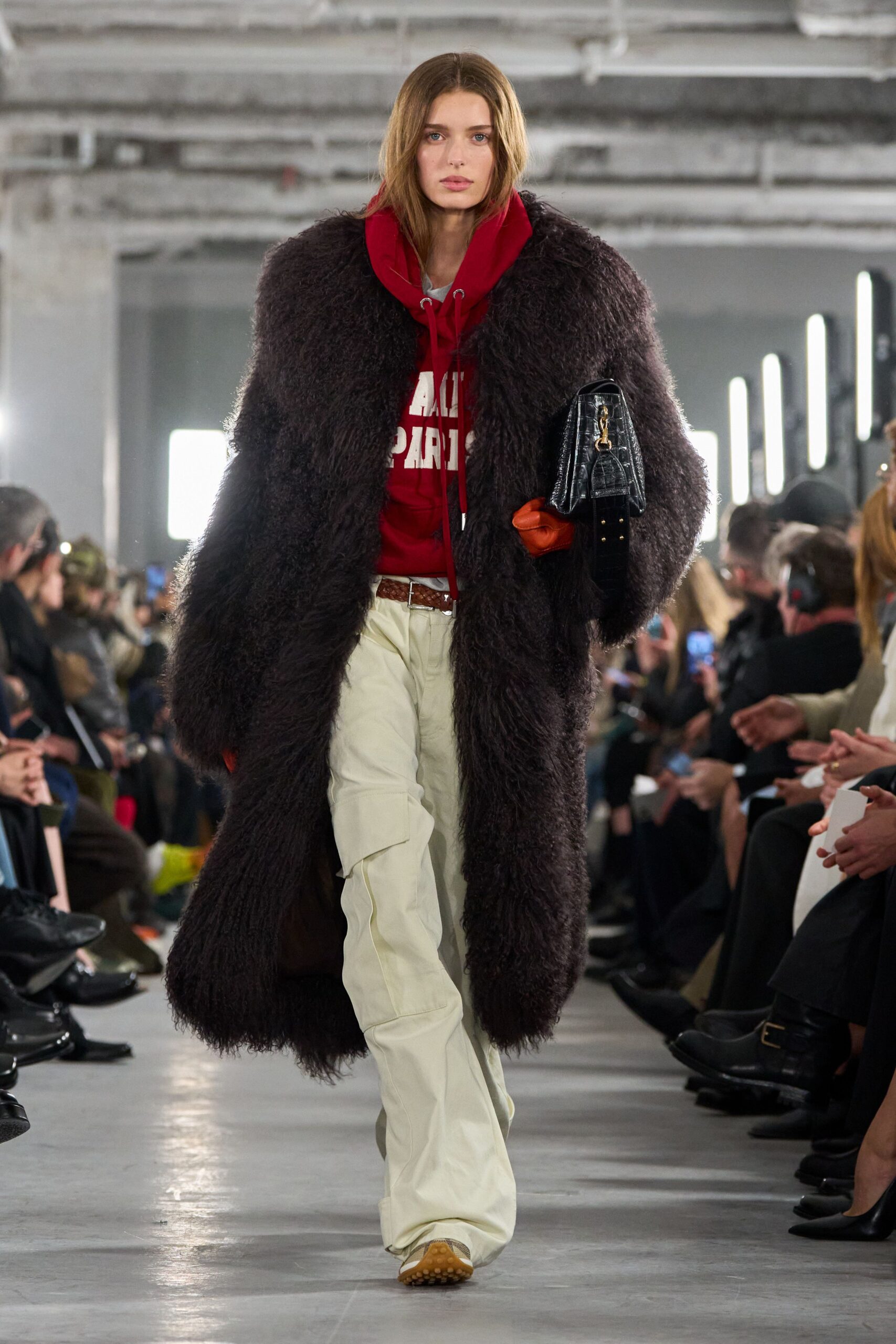 oversized brown fur coat with red hoodie