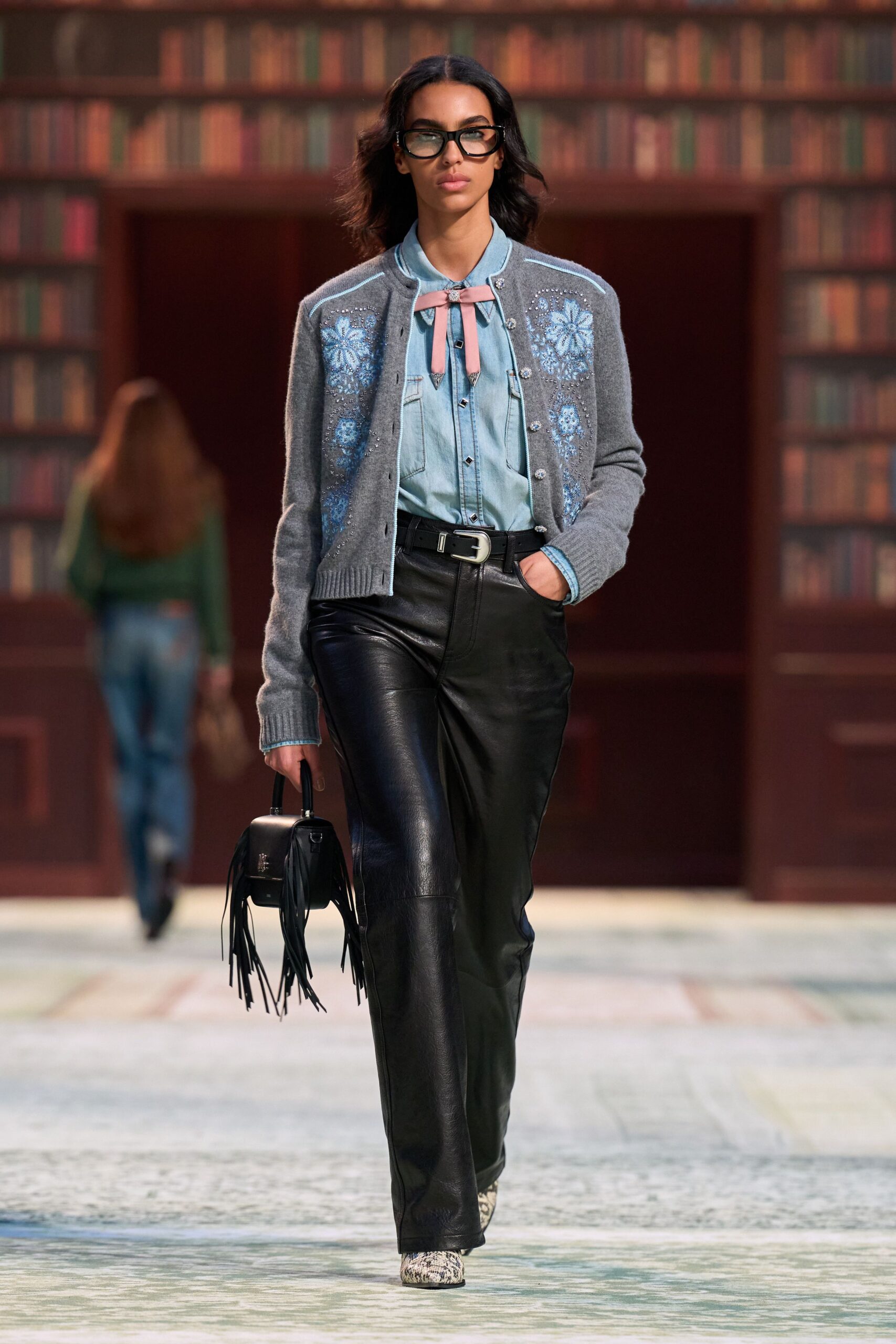 gray embroidered cardigan with blue shirt