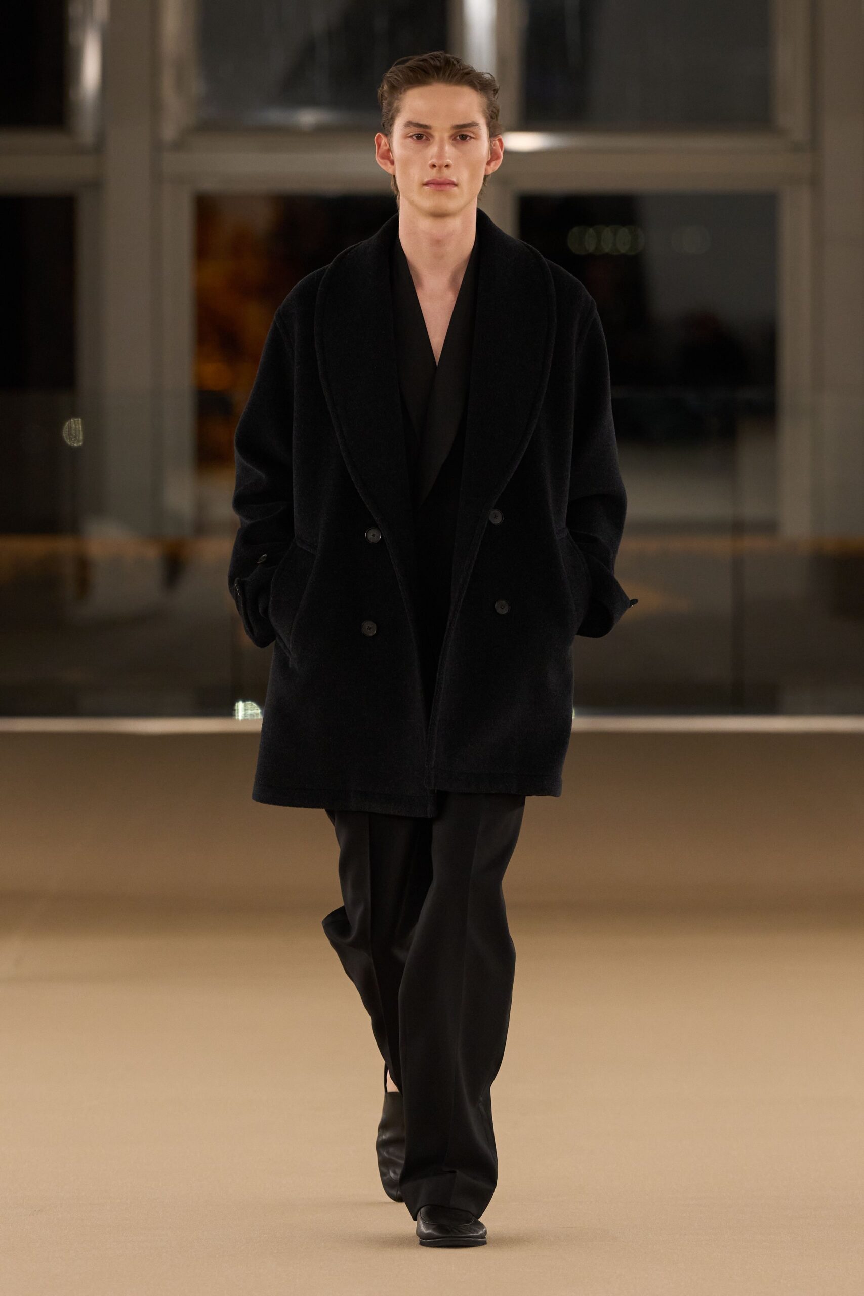 black wool coat with tailored pants