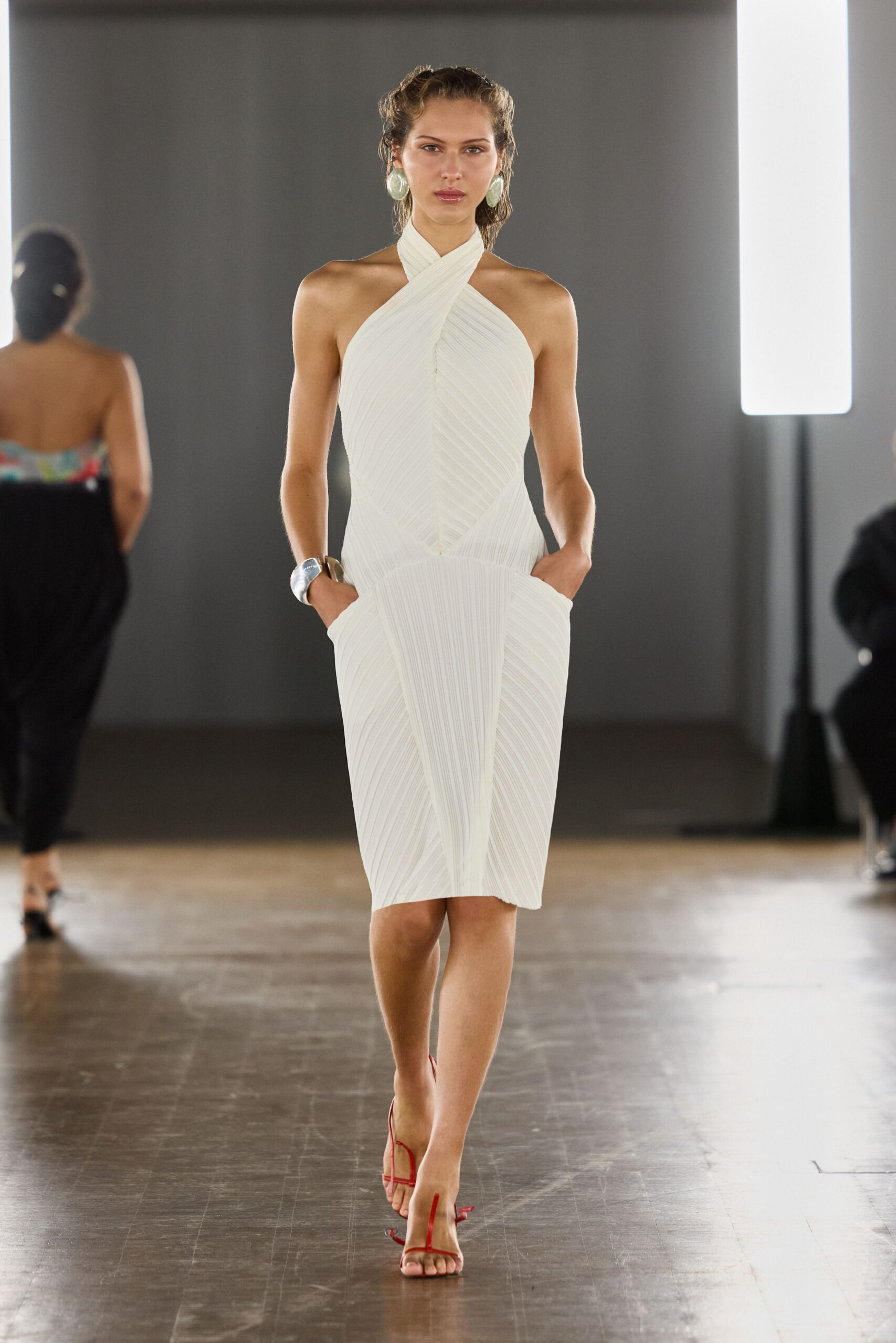 white pleated midi dress with red shoes