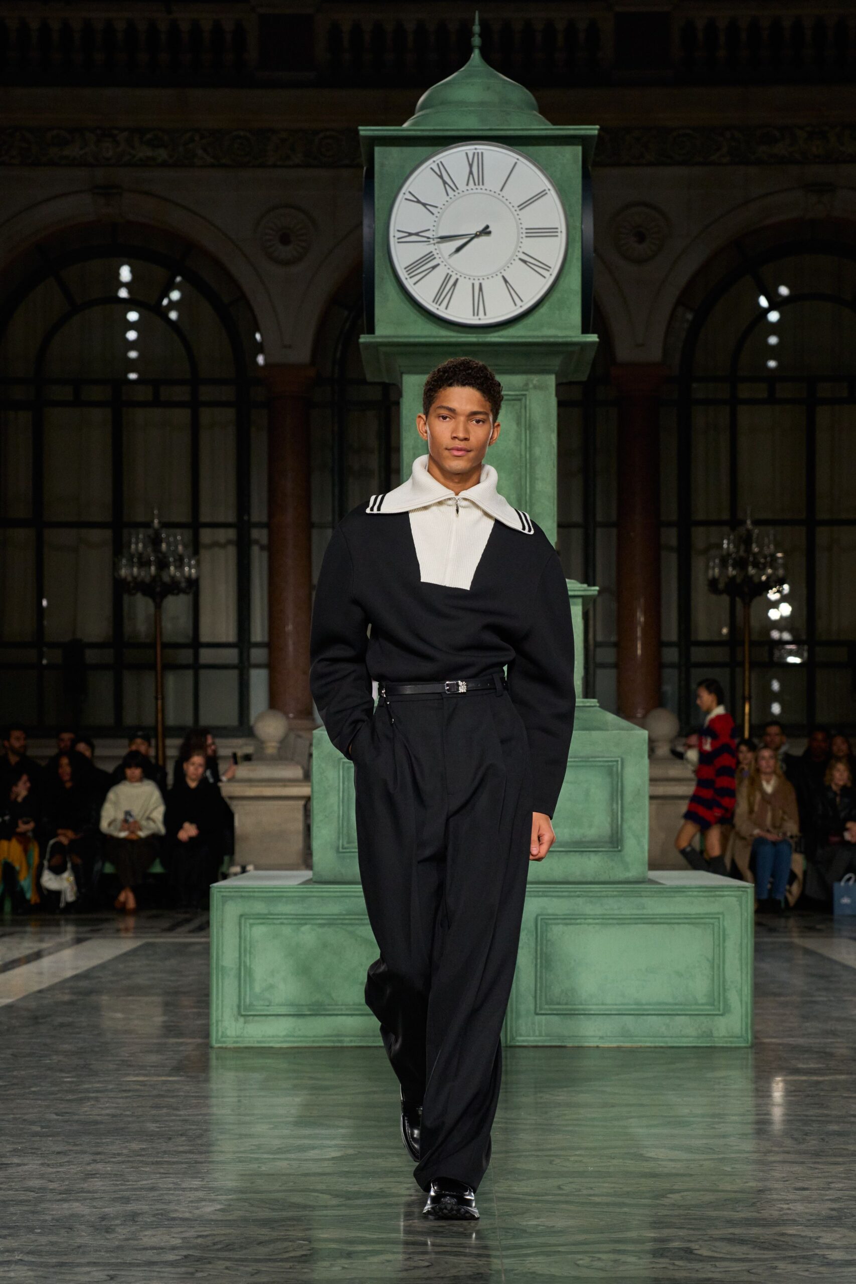 black wool sweater and tailored pants