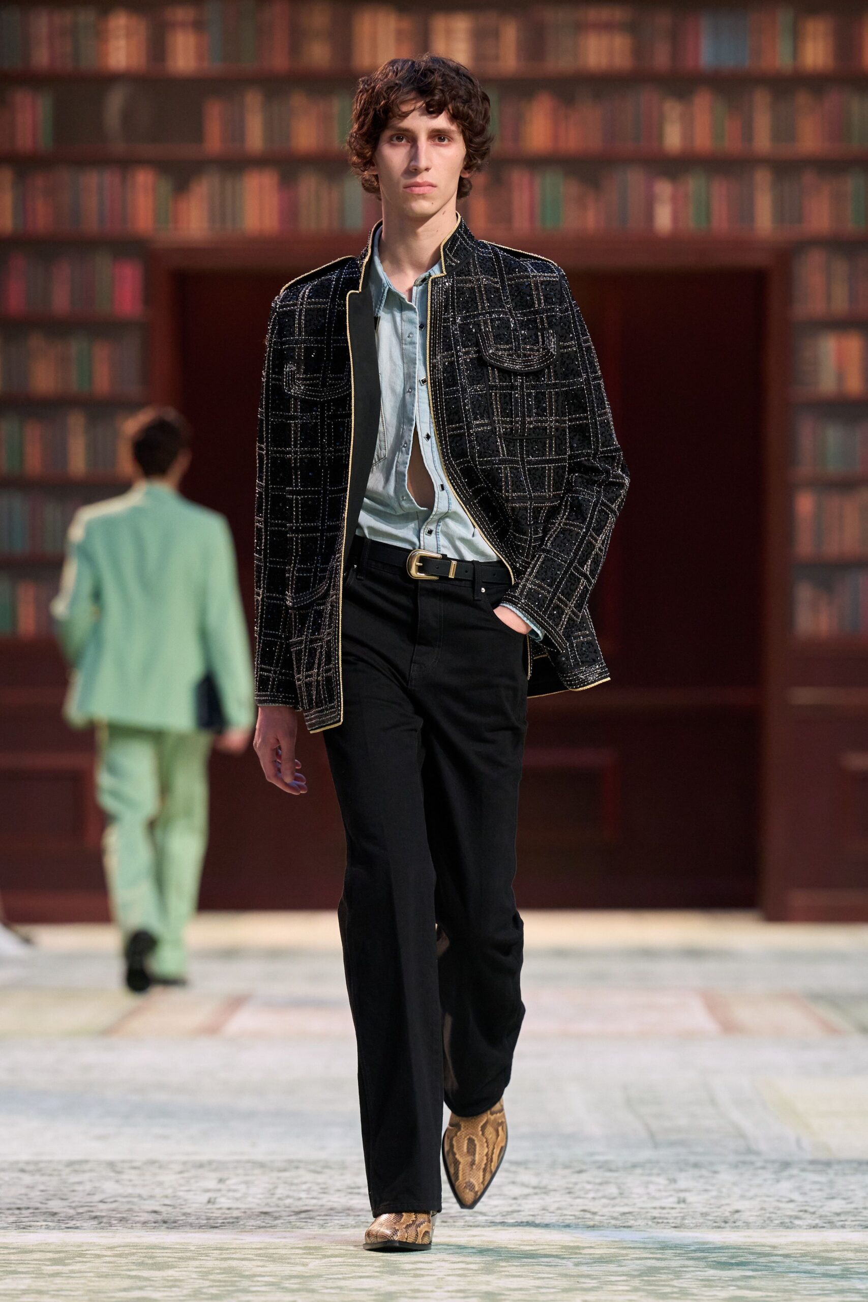 black structured jacket with blue shirt