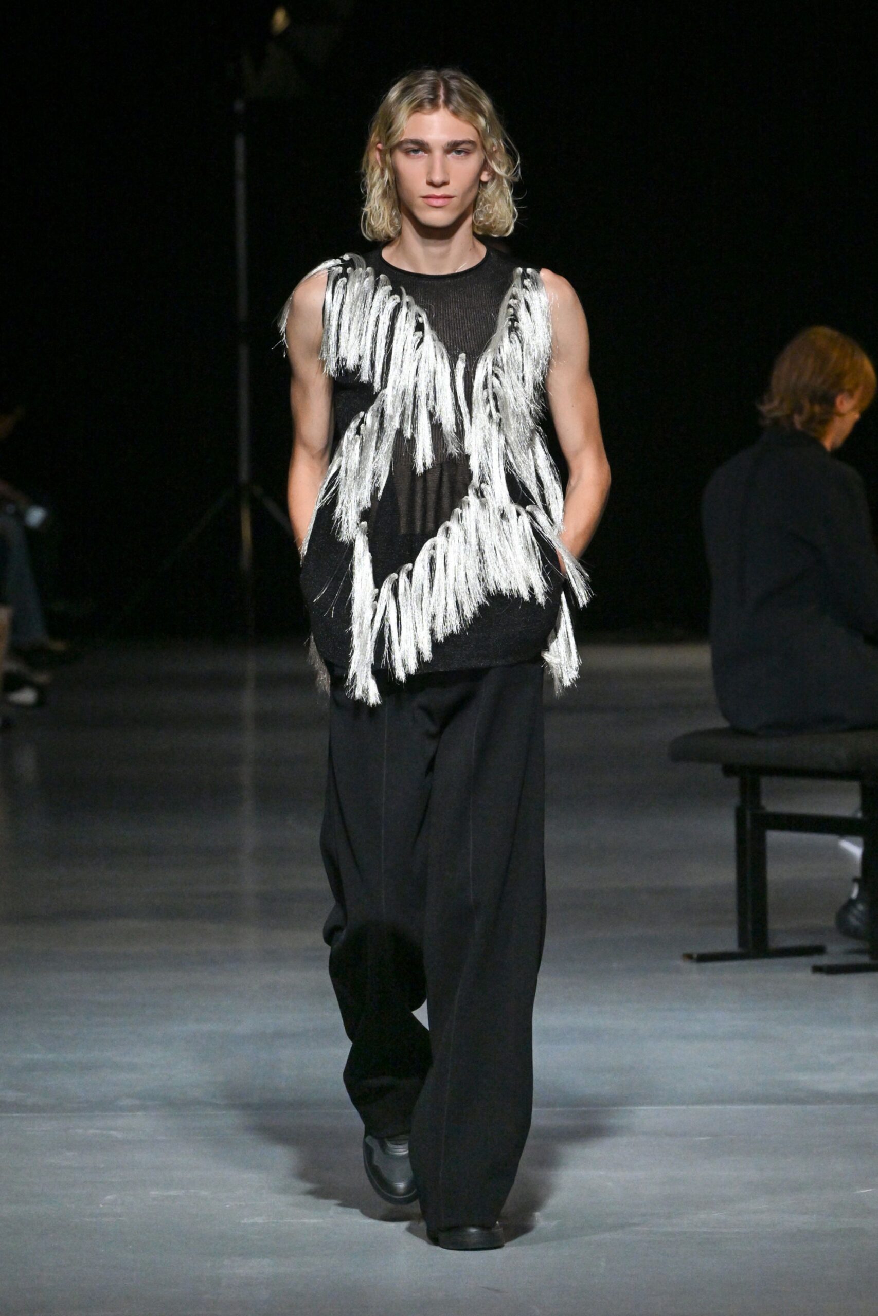black and white fringed top with relaxed pants