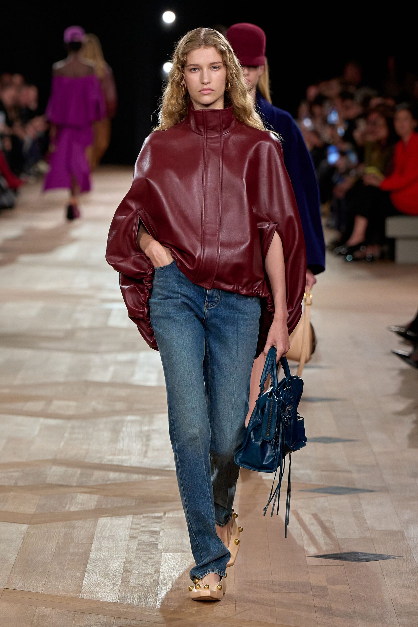 red leather long-sleeve high-neck relaxed draped top