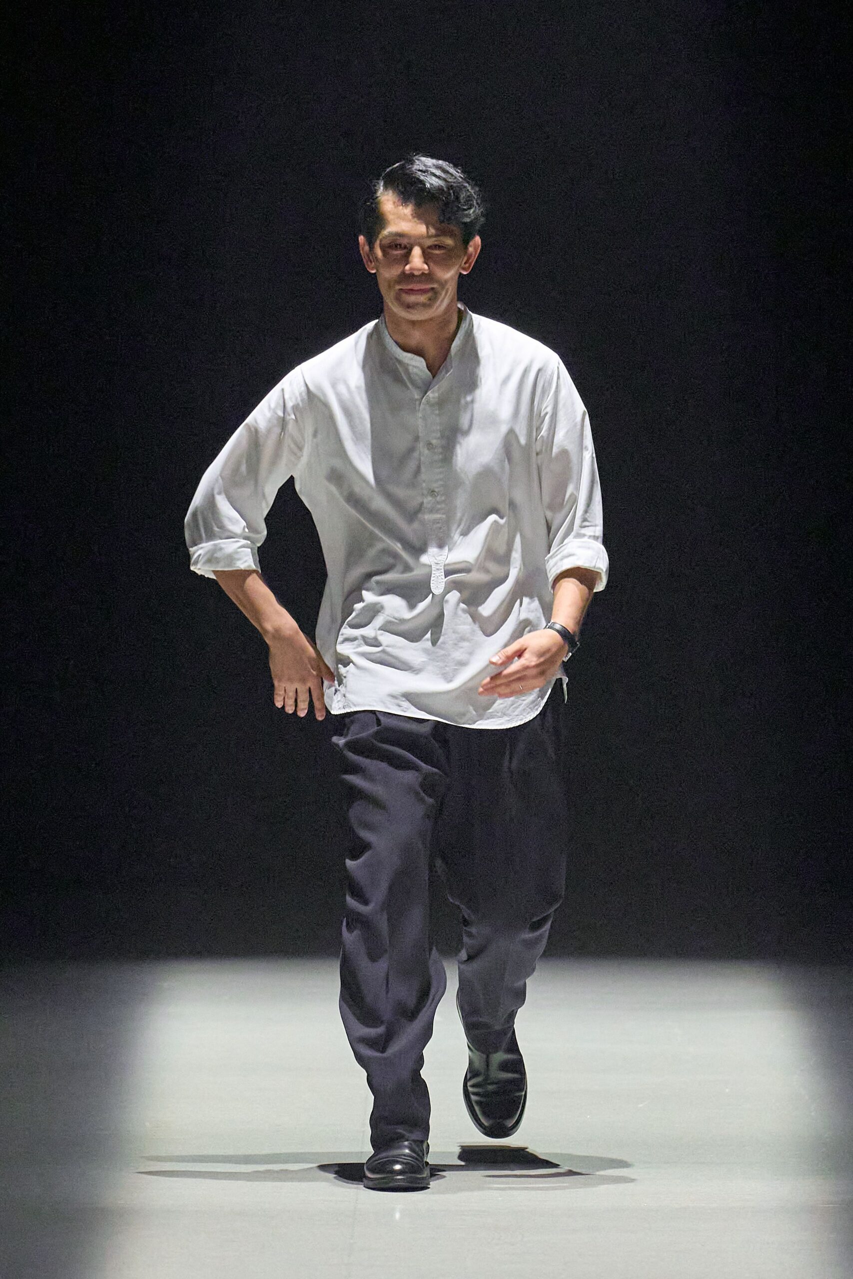 white relaxed shirt black pants