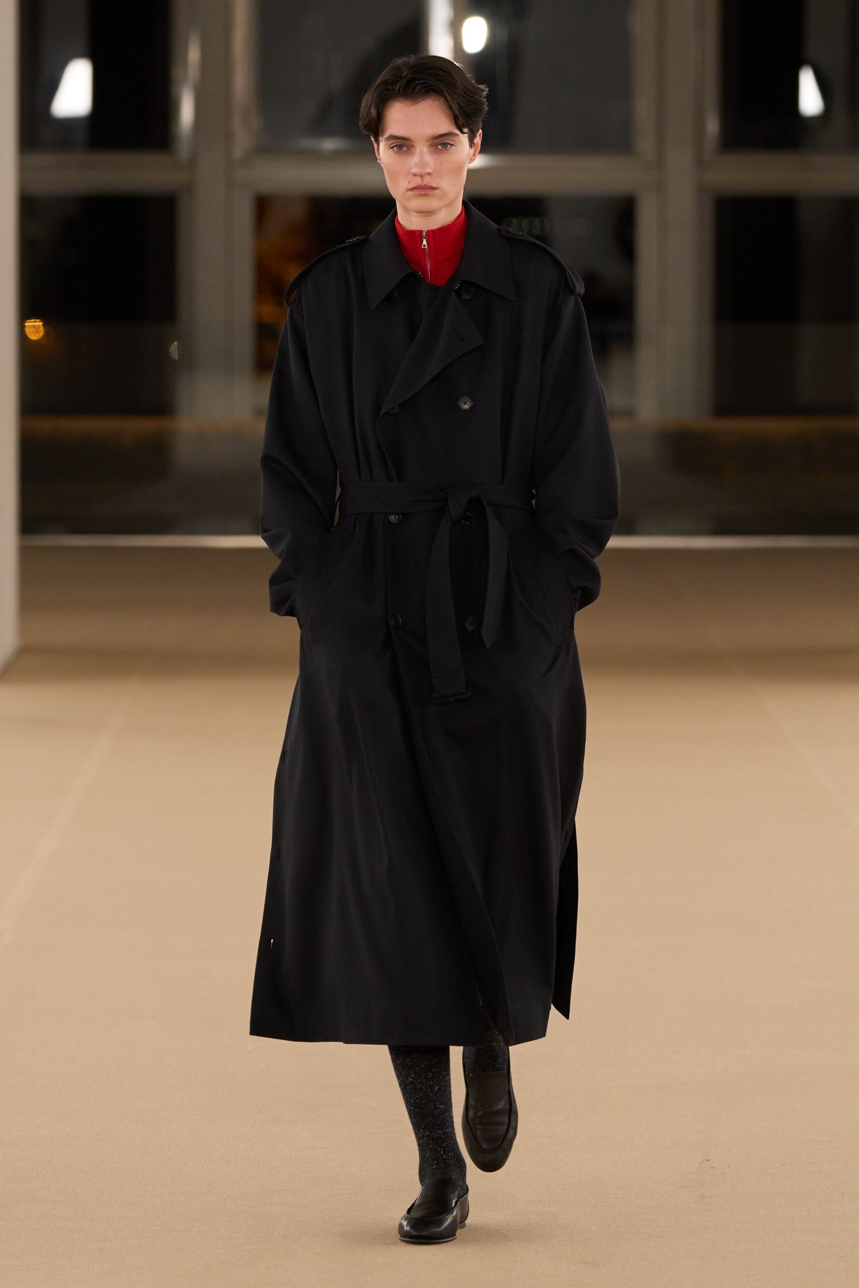 black trench coat red top