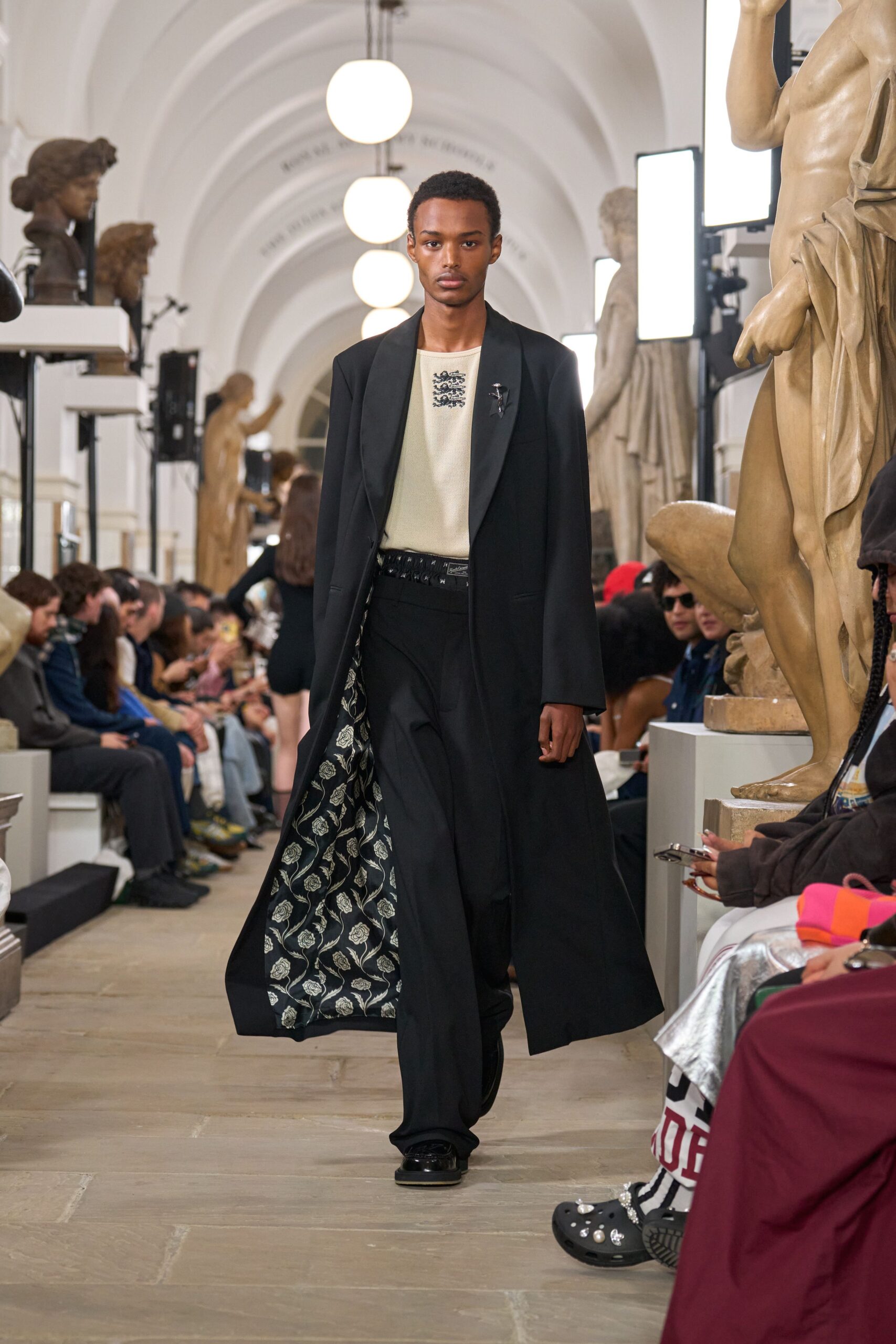 black coat with white top
