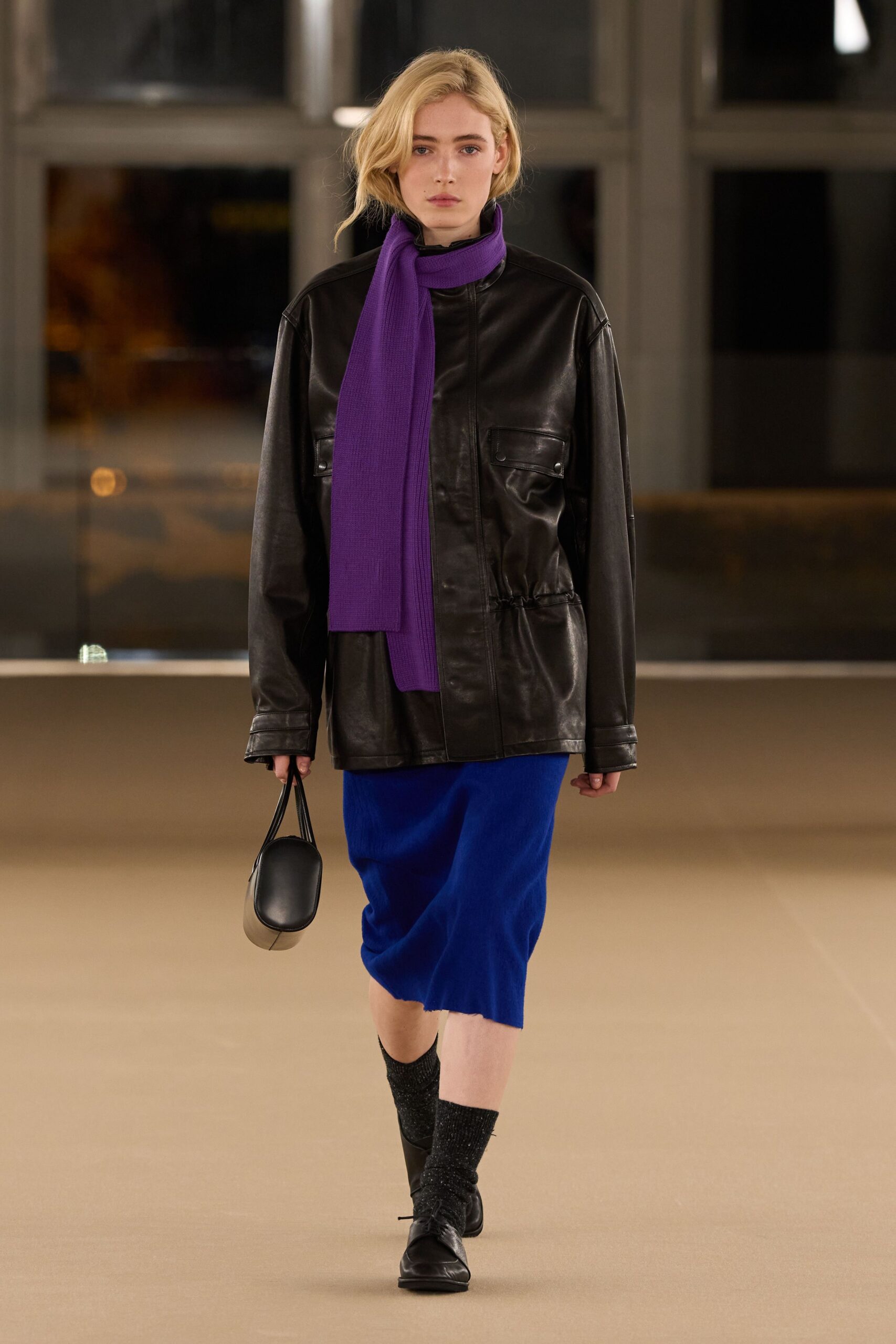 black leather jacket blue skirt