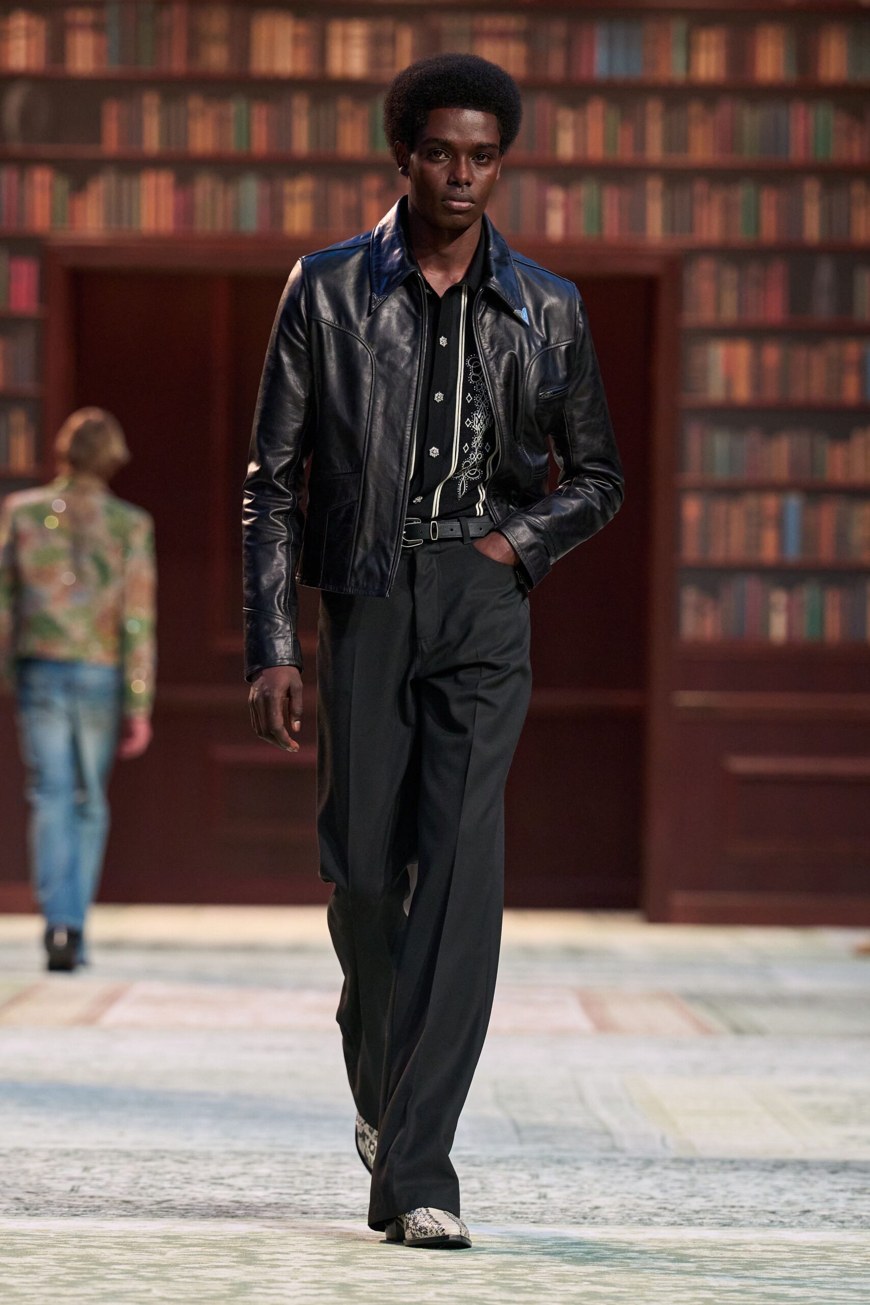 black leather jacket with embroidered shirt