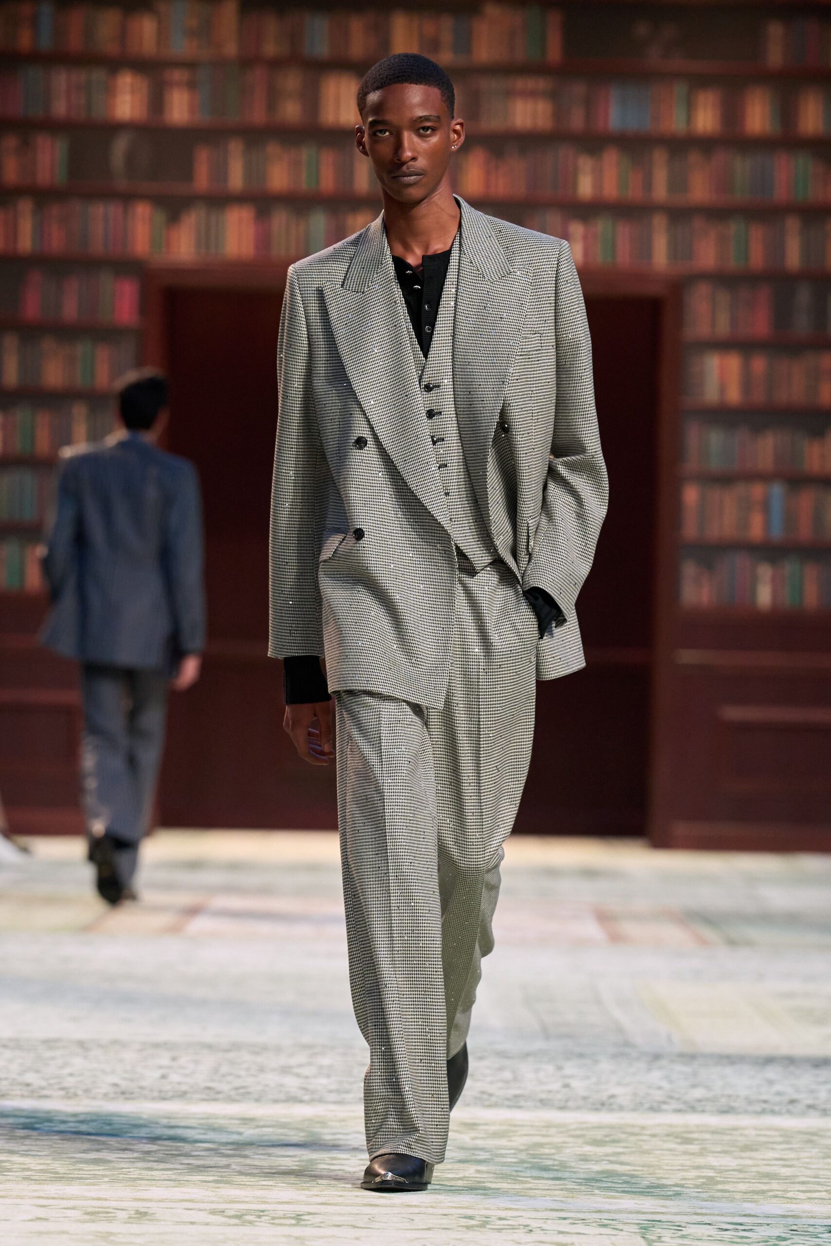 gray tailored suit with black shirt