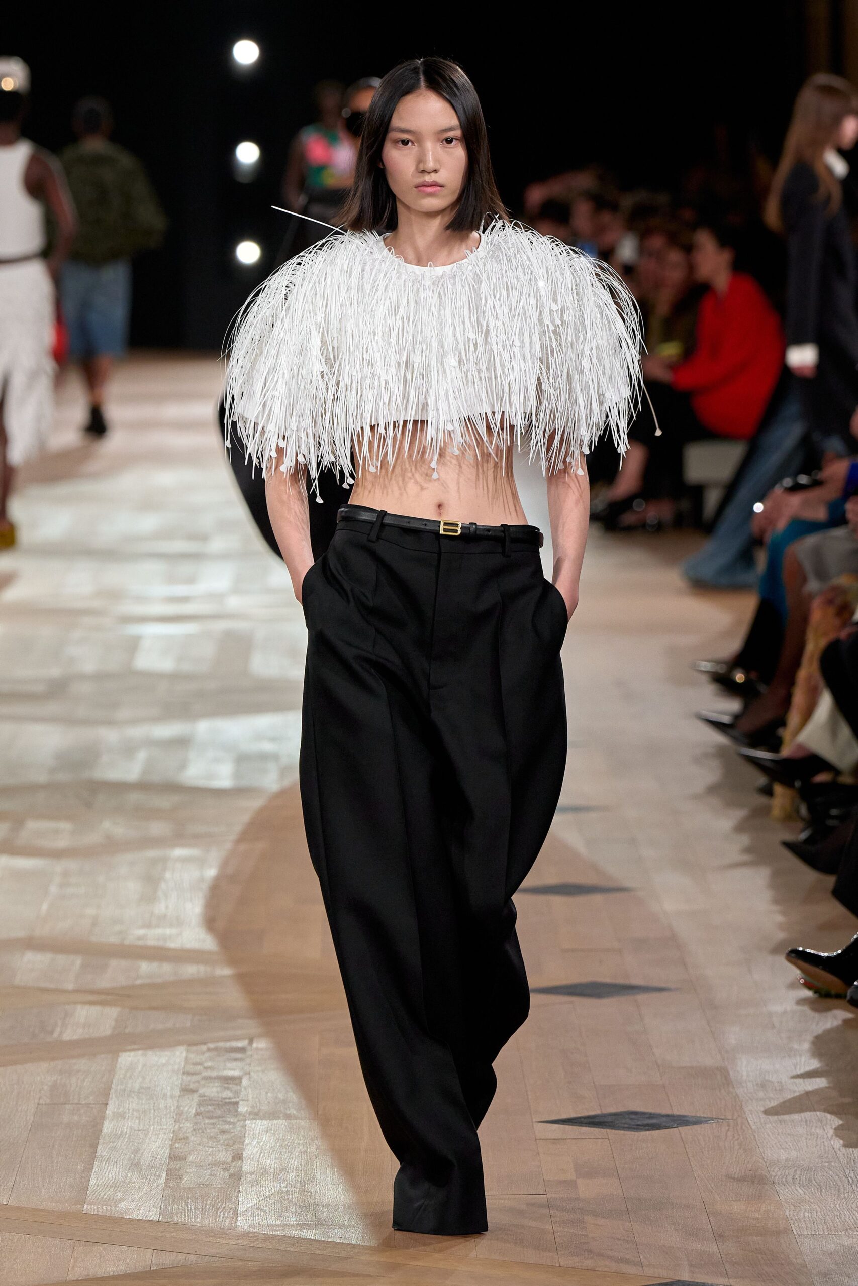 white fringed top with black pants