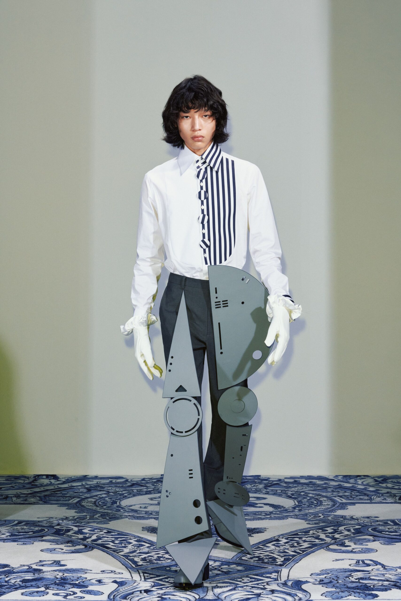 white shirt with blue stripes and gray pants