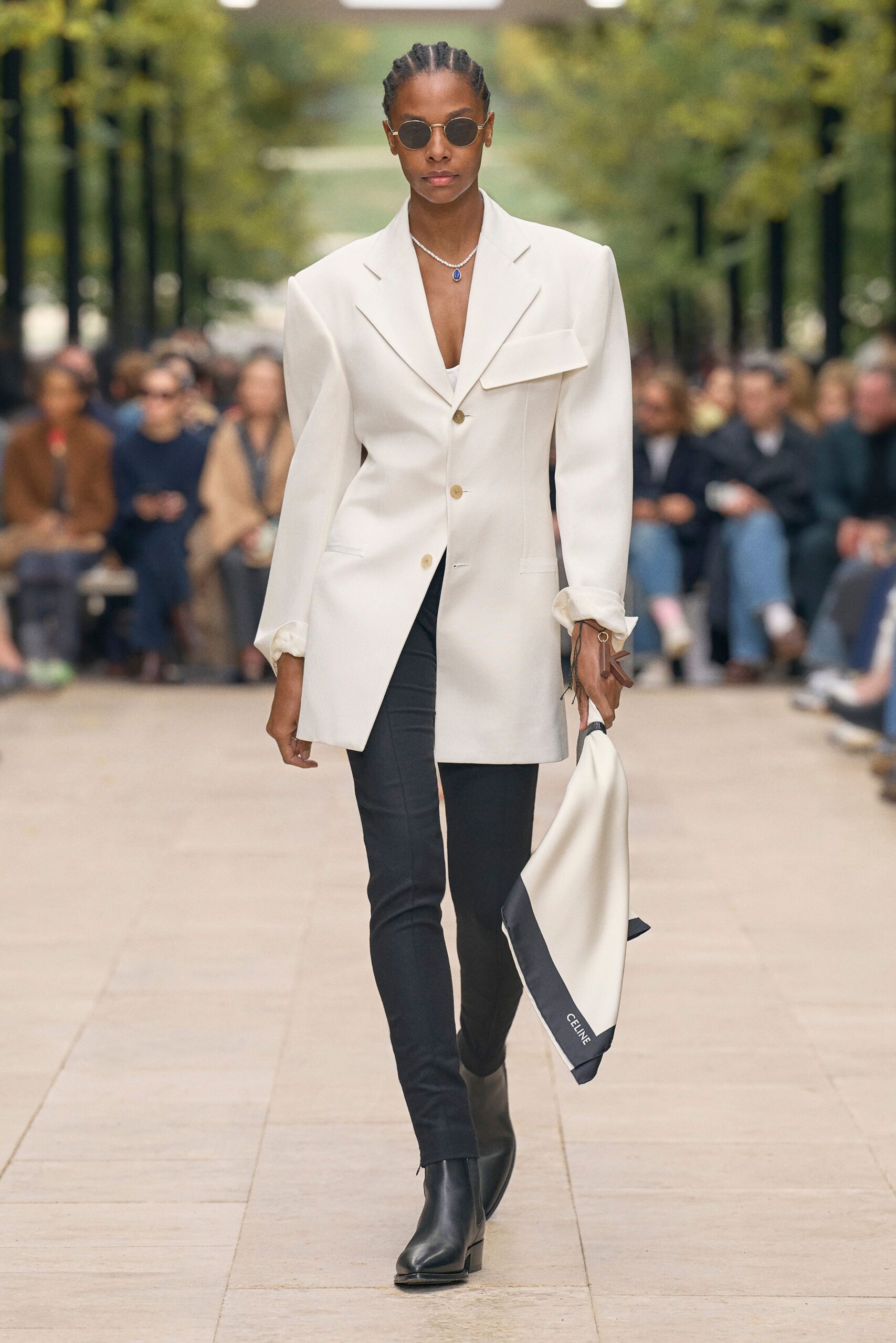 white structured blazer with black pants