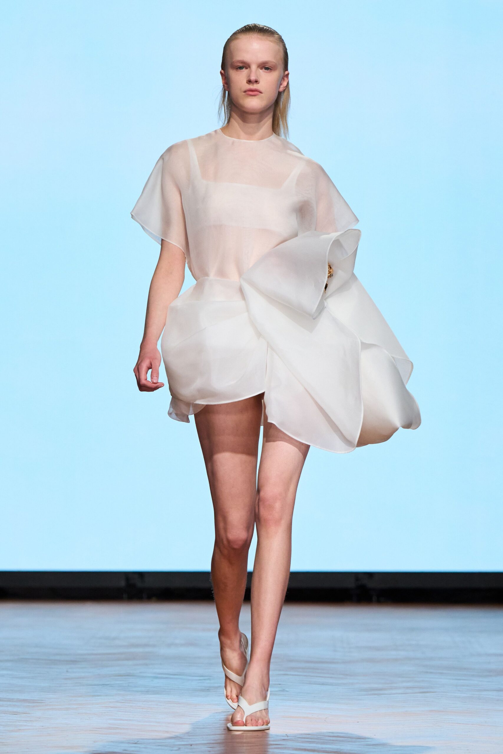 white silk sleeveless high-neck fitted pleated layered dress