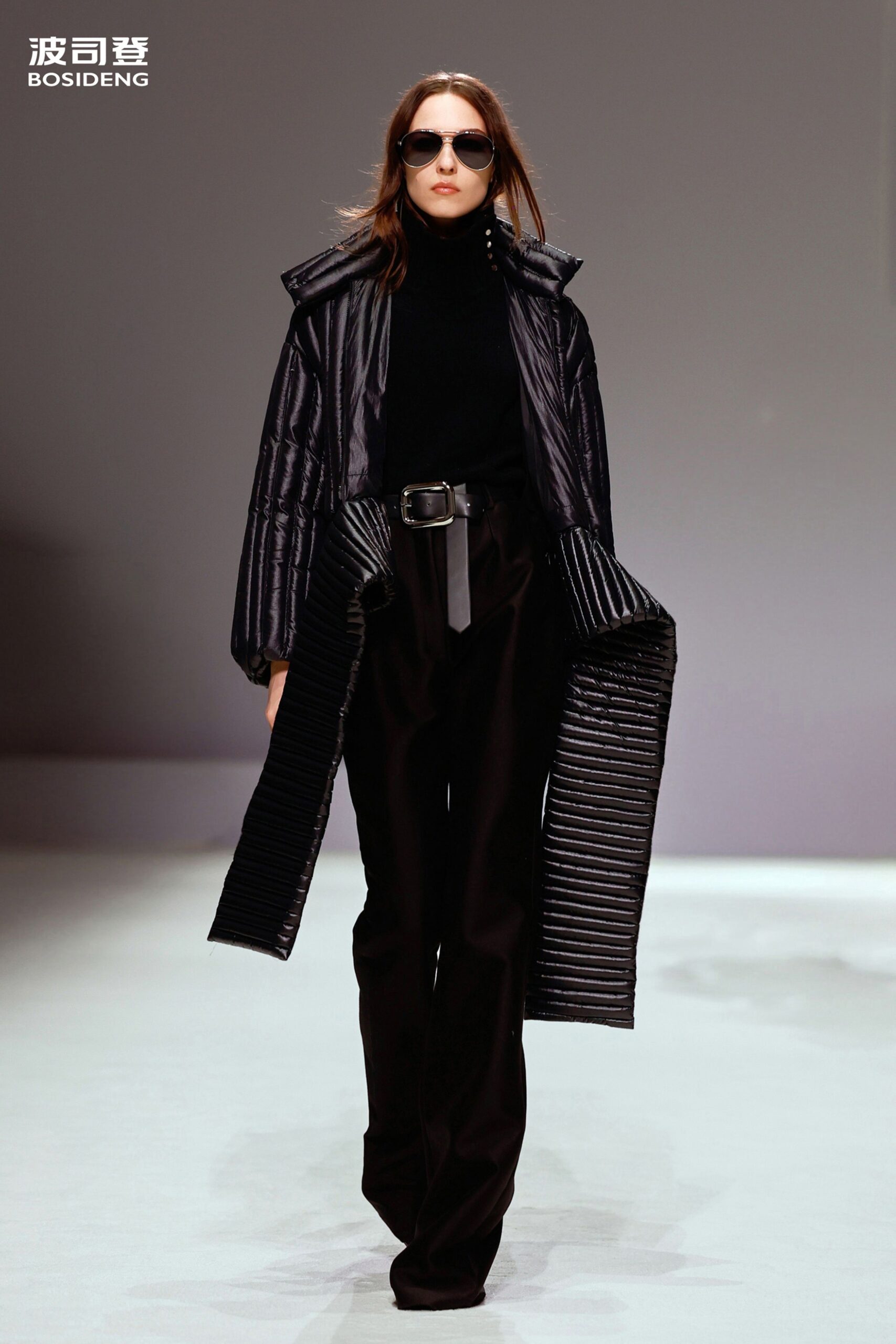 black vinyl long-sleeve collared relaxed zippered padded coat