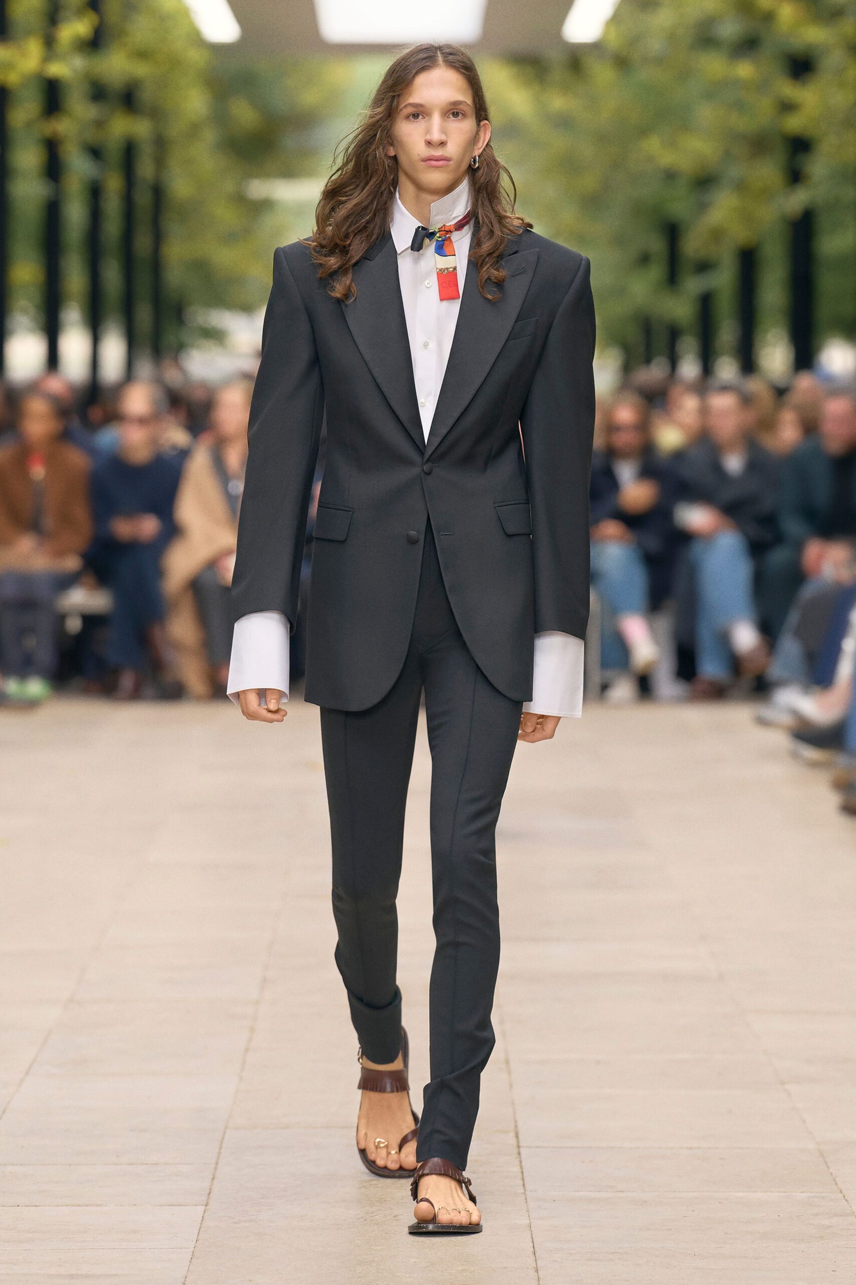 black tailored suit with brown shoes
