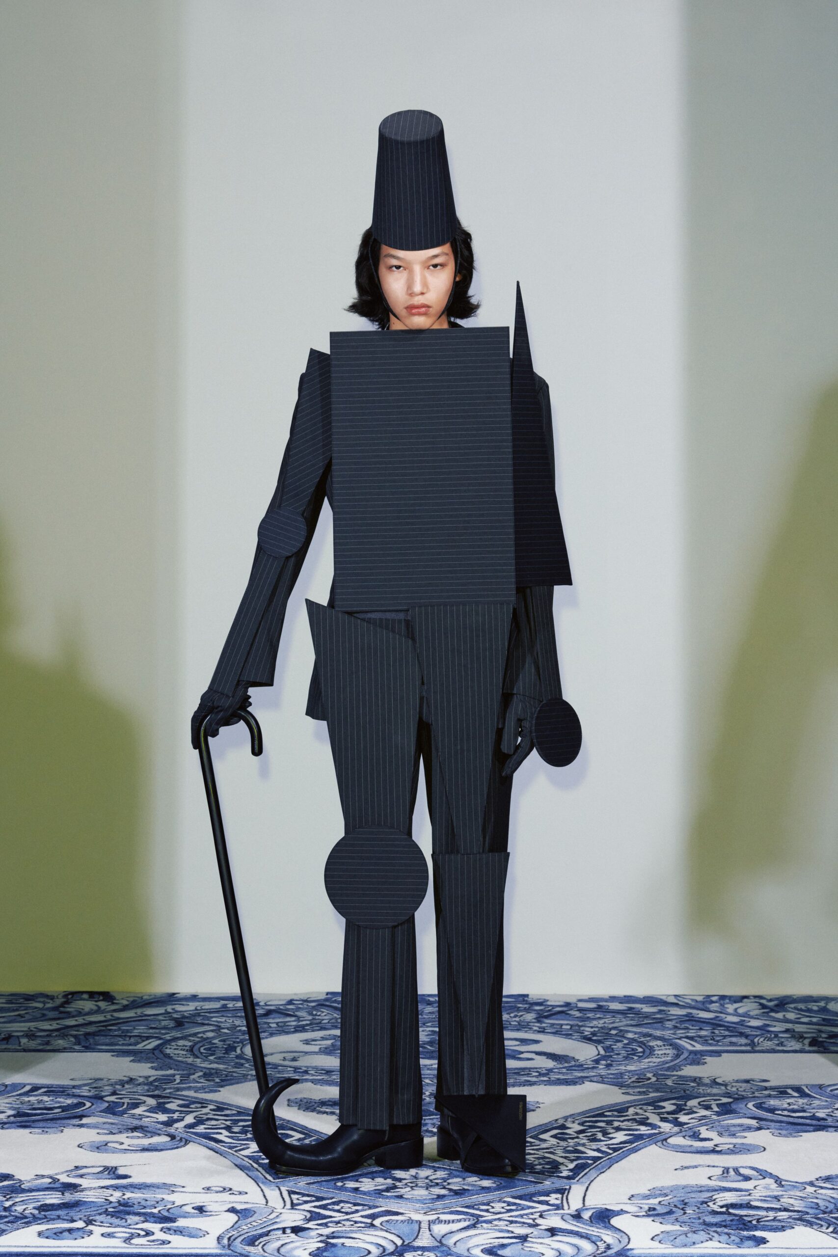 black cotton long-sleeve collared structured layered suit