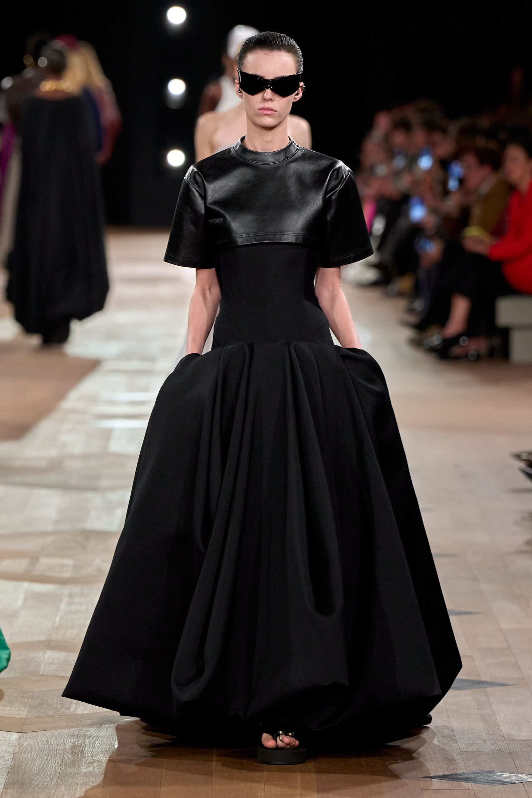 black leather gown with sunglasses