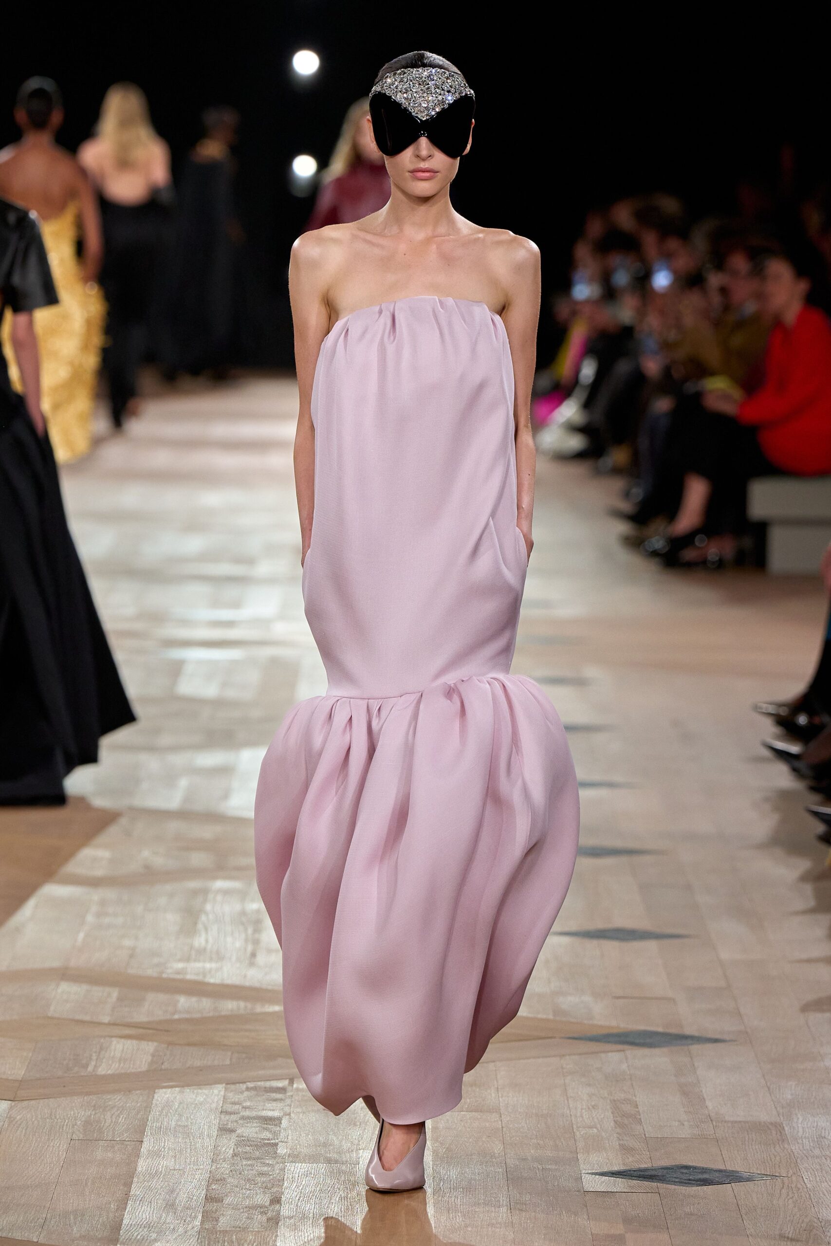 pink silk strapless fitted pleated flowing maxi gown