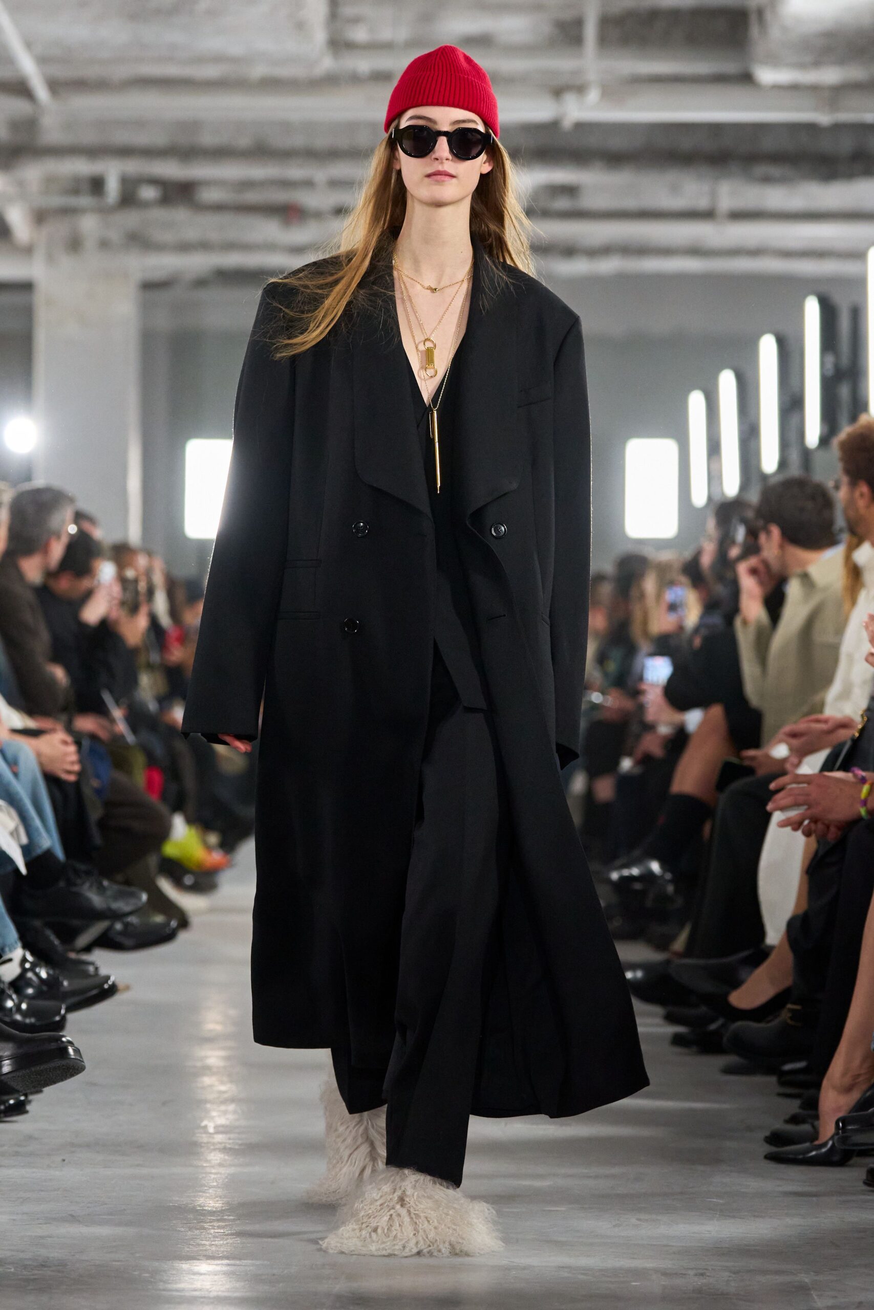 oversized black coat with red hat