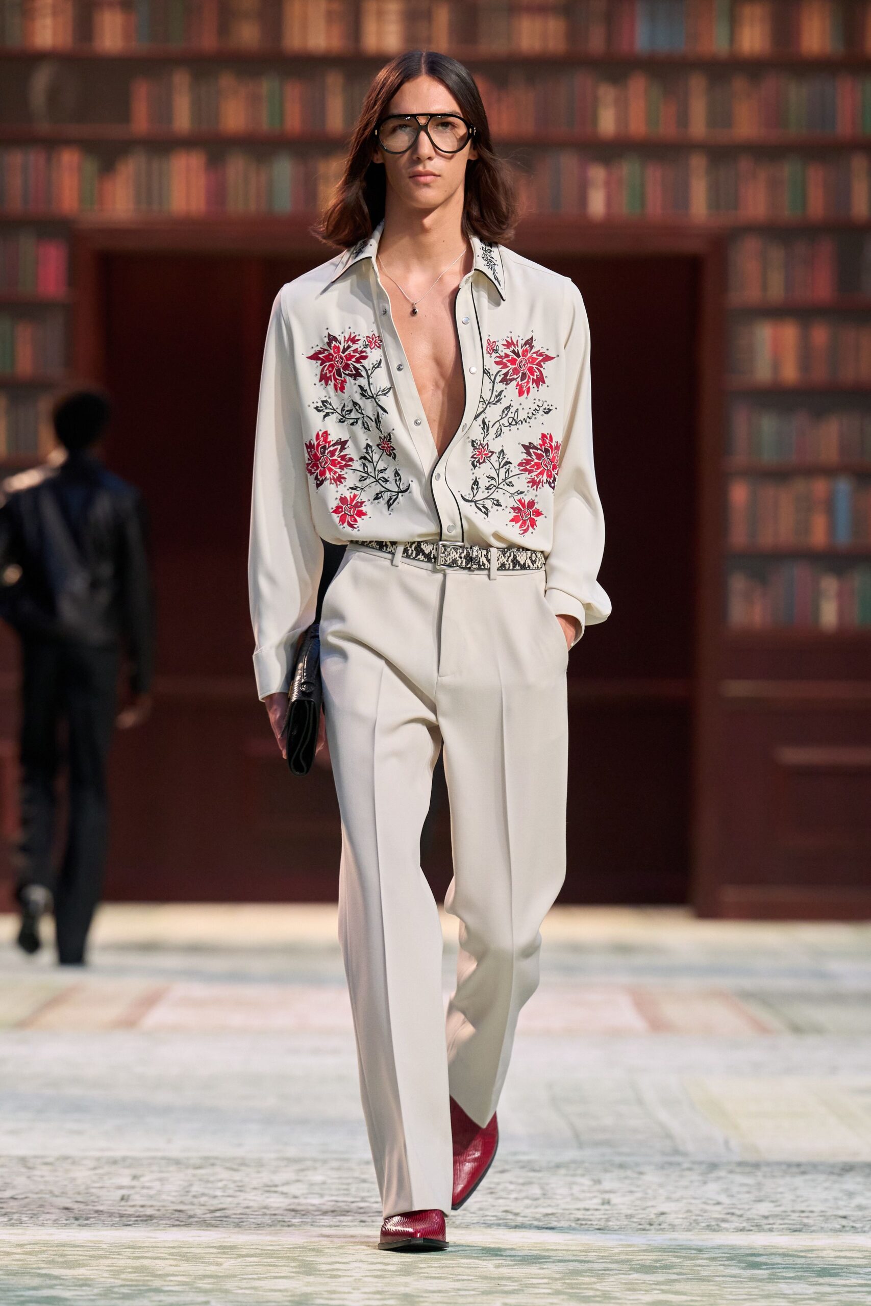 white embroidered shirt with beige pants