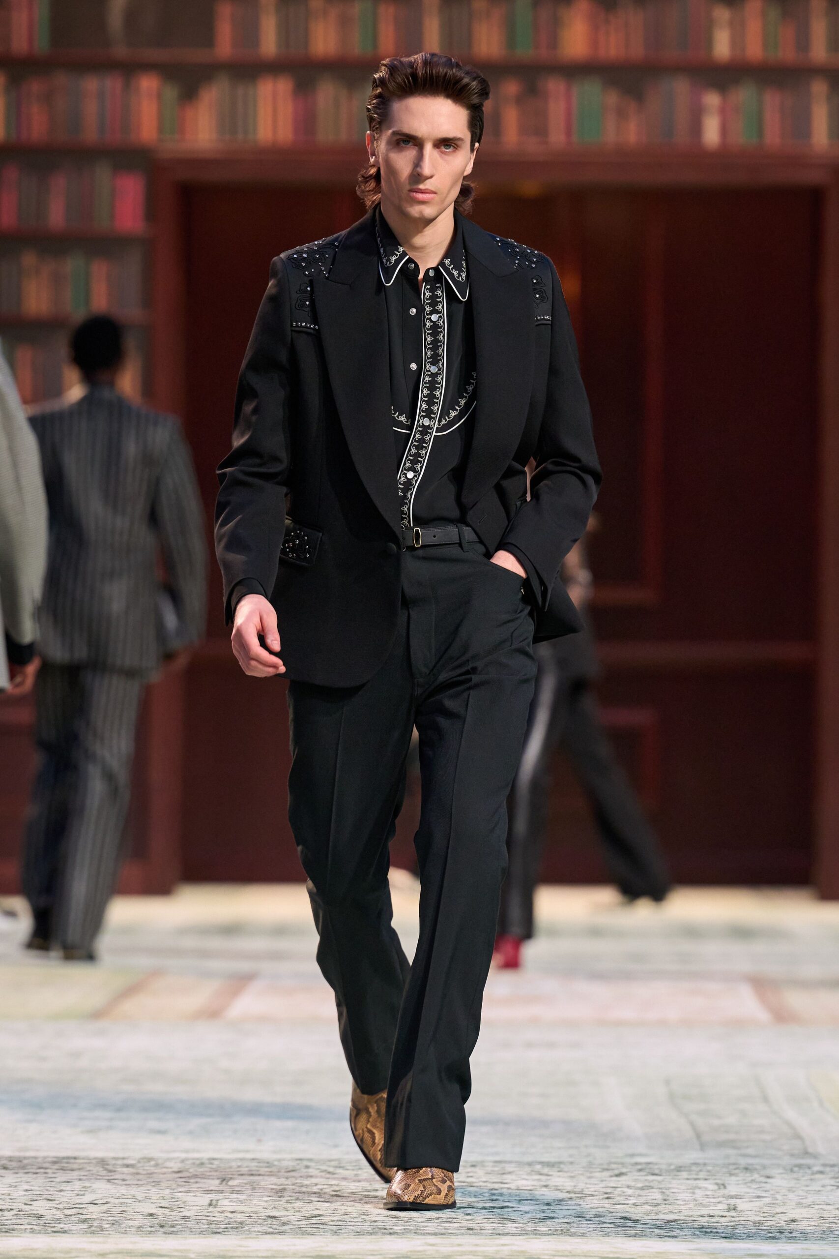 black tailored suit with white shirt