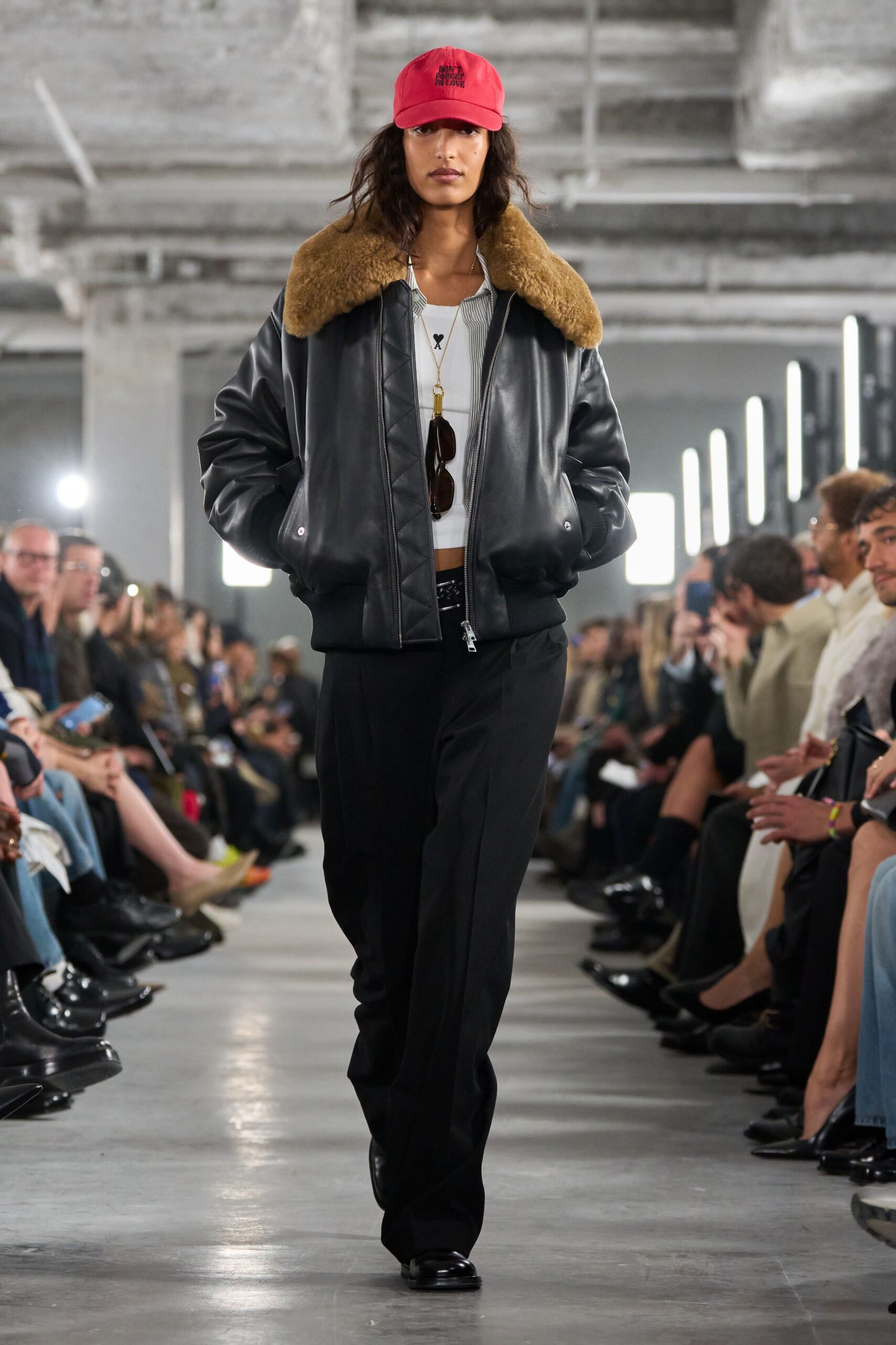 black leather jacket with red cap