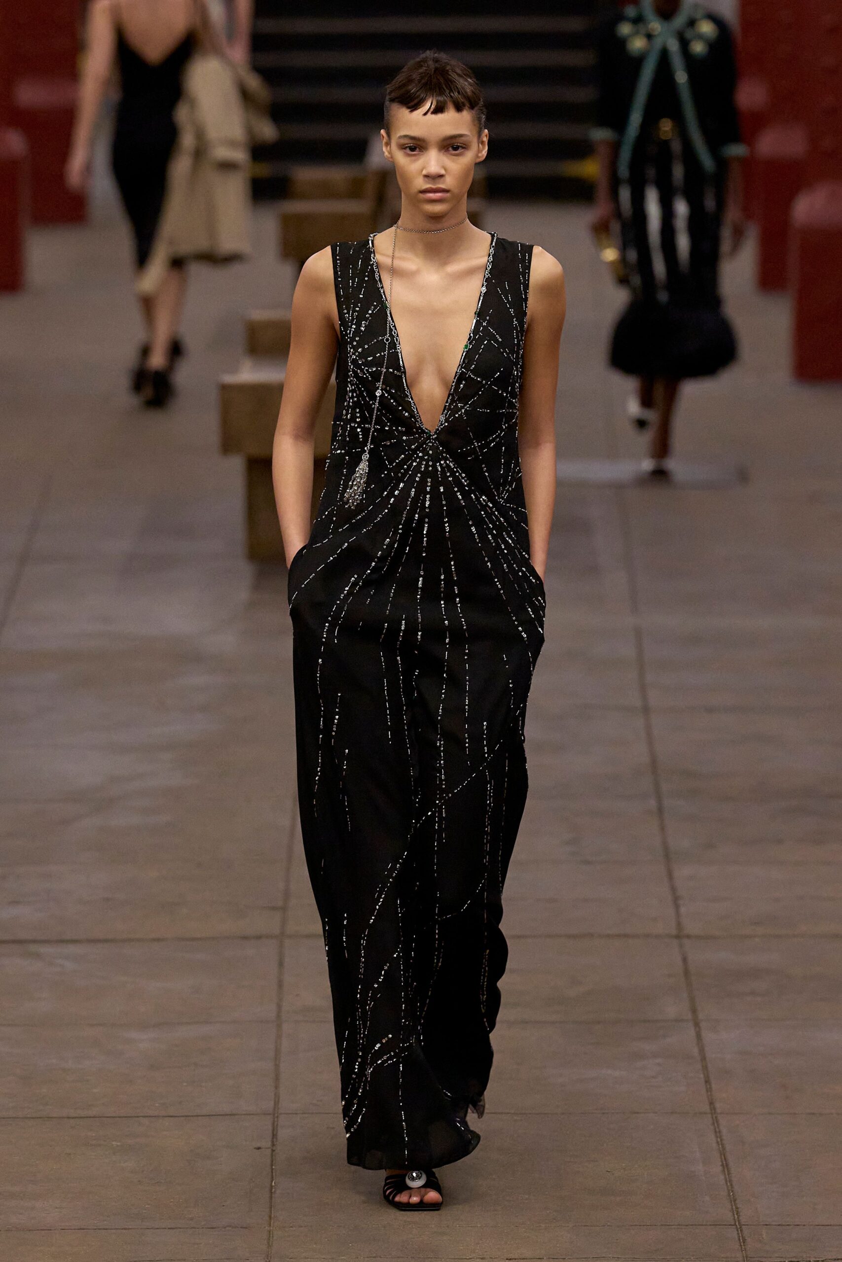 black silk sleeveless v-neck fitted beaded maxi gown