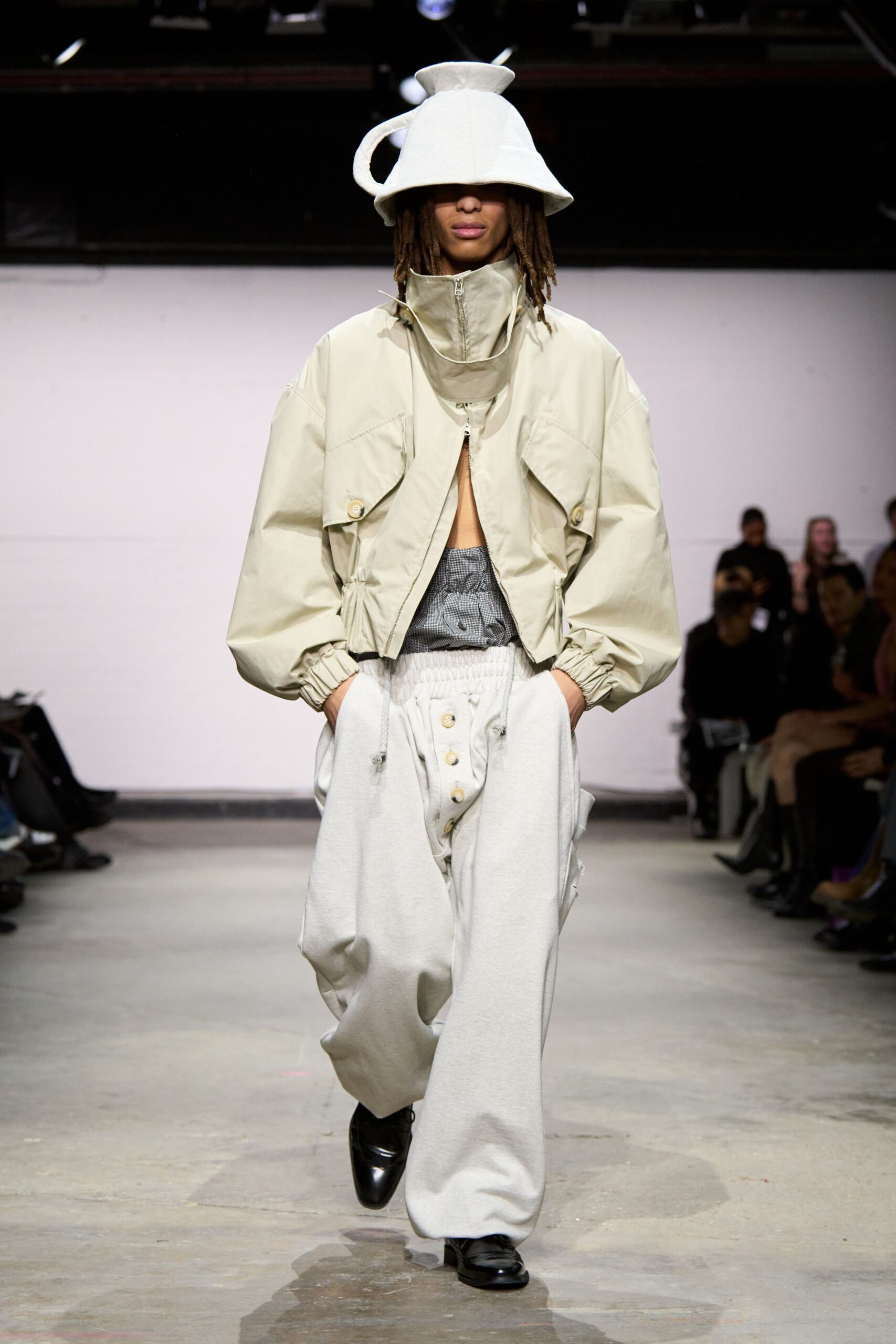 beige oversized jacket with black top