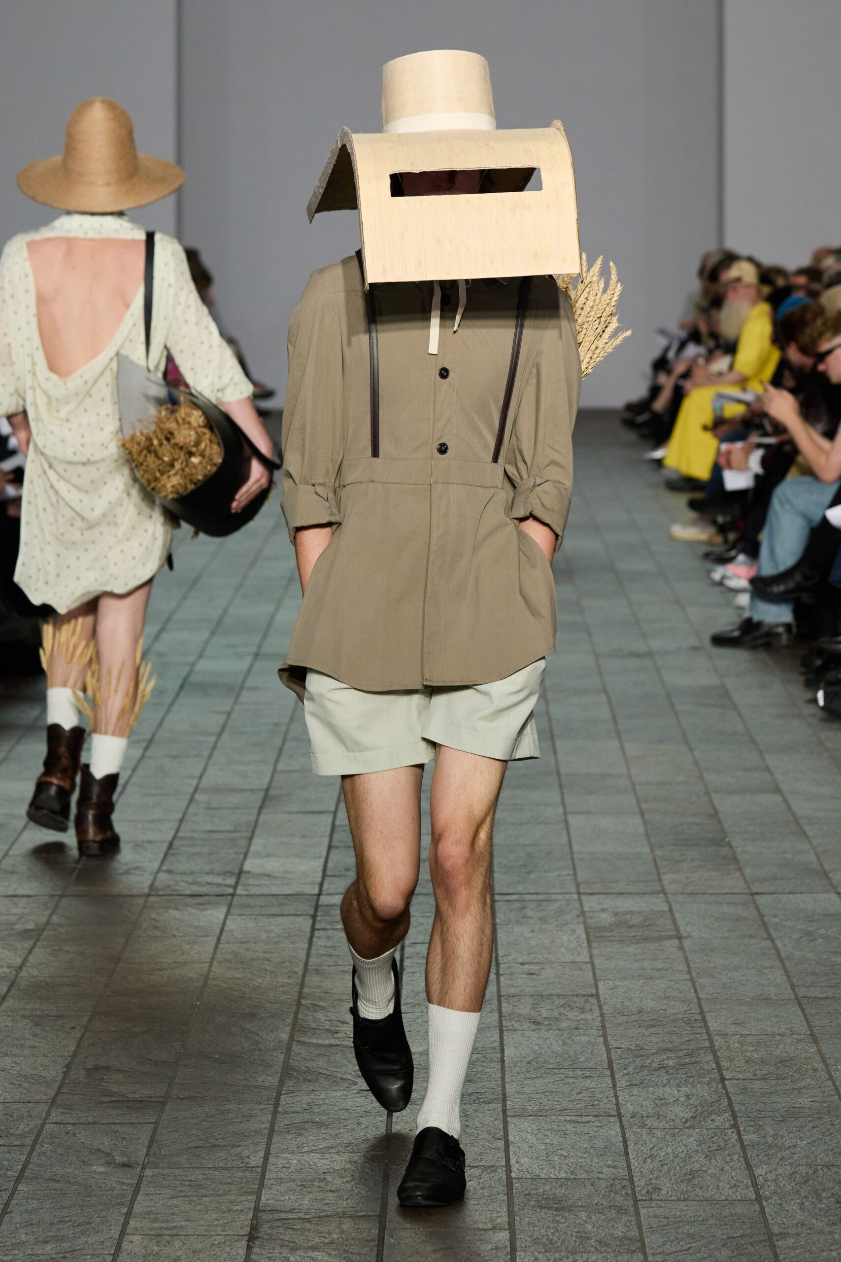 beige shirt and light green shorts