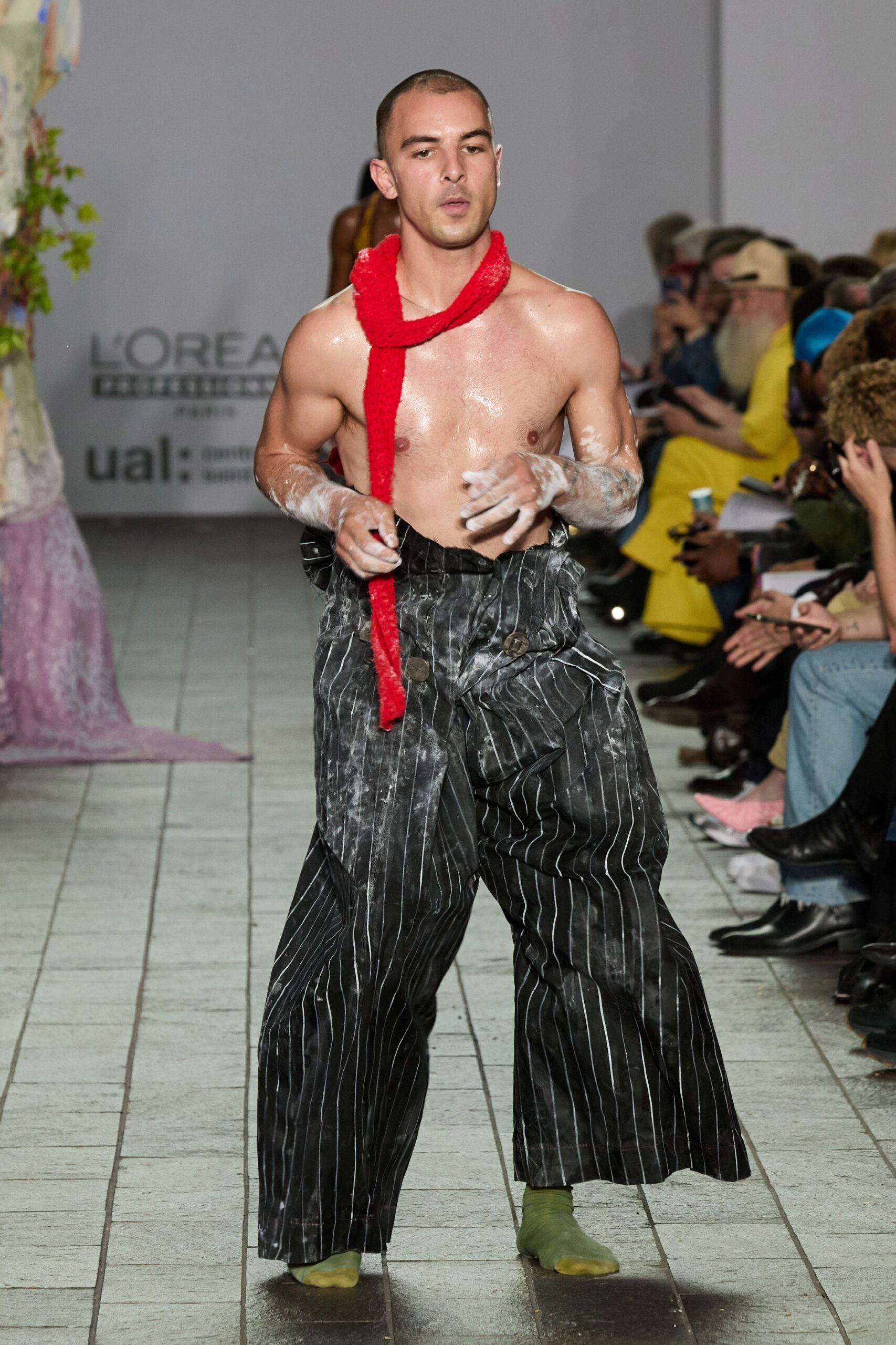 relaxed black and white striped pants with red scarf