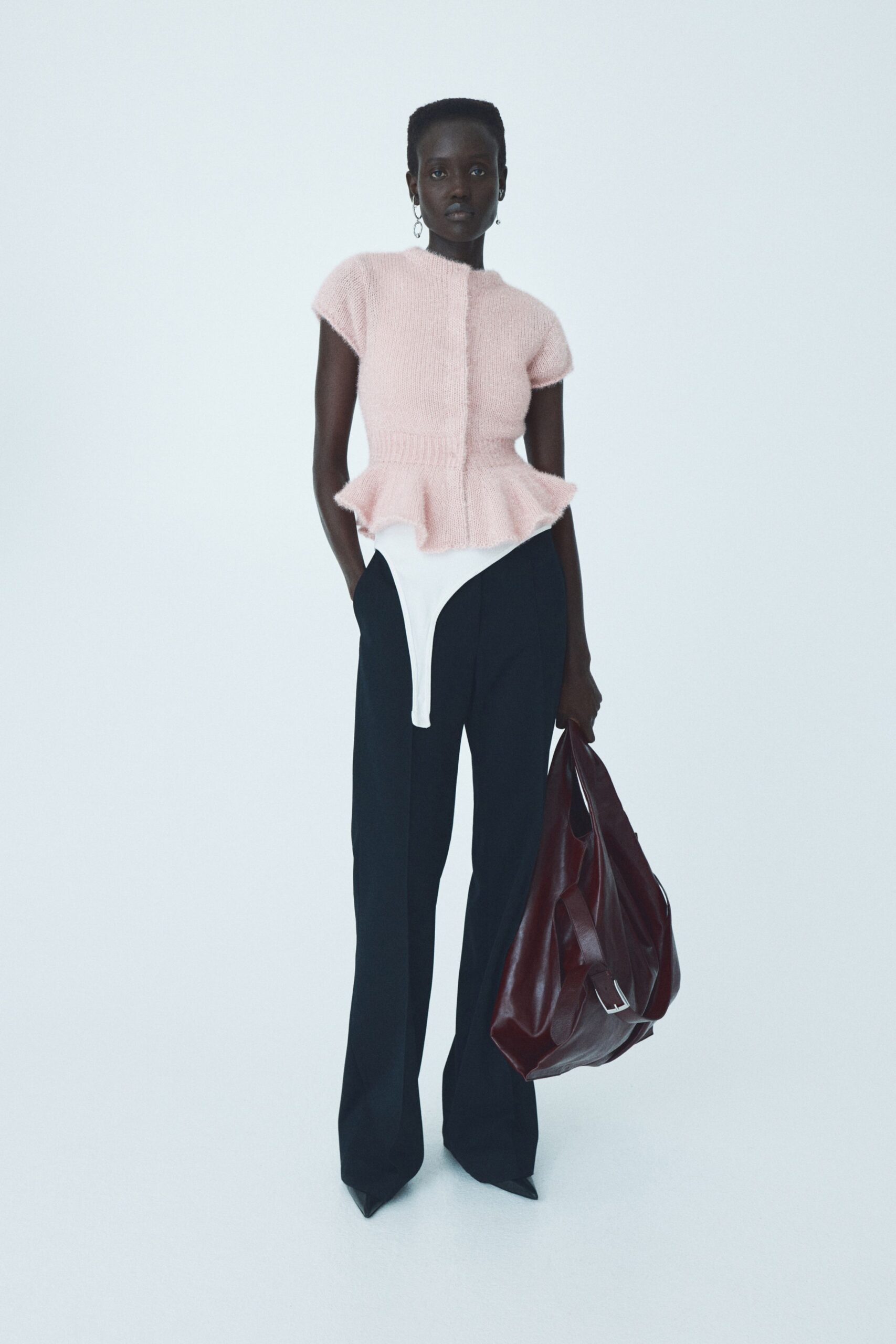 pink wool short-sleeve collared fitted ruffled top