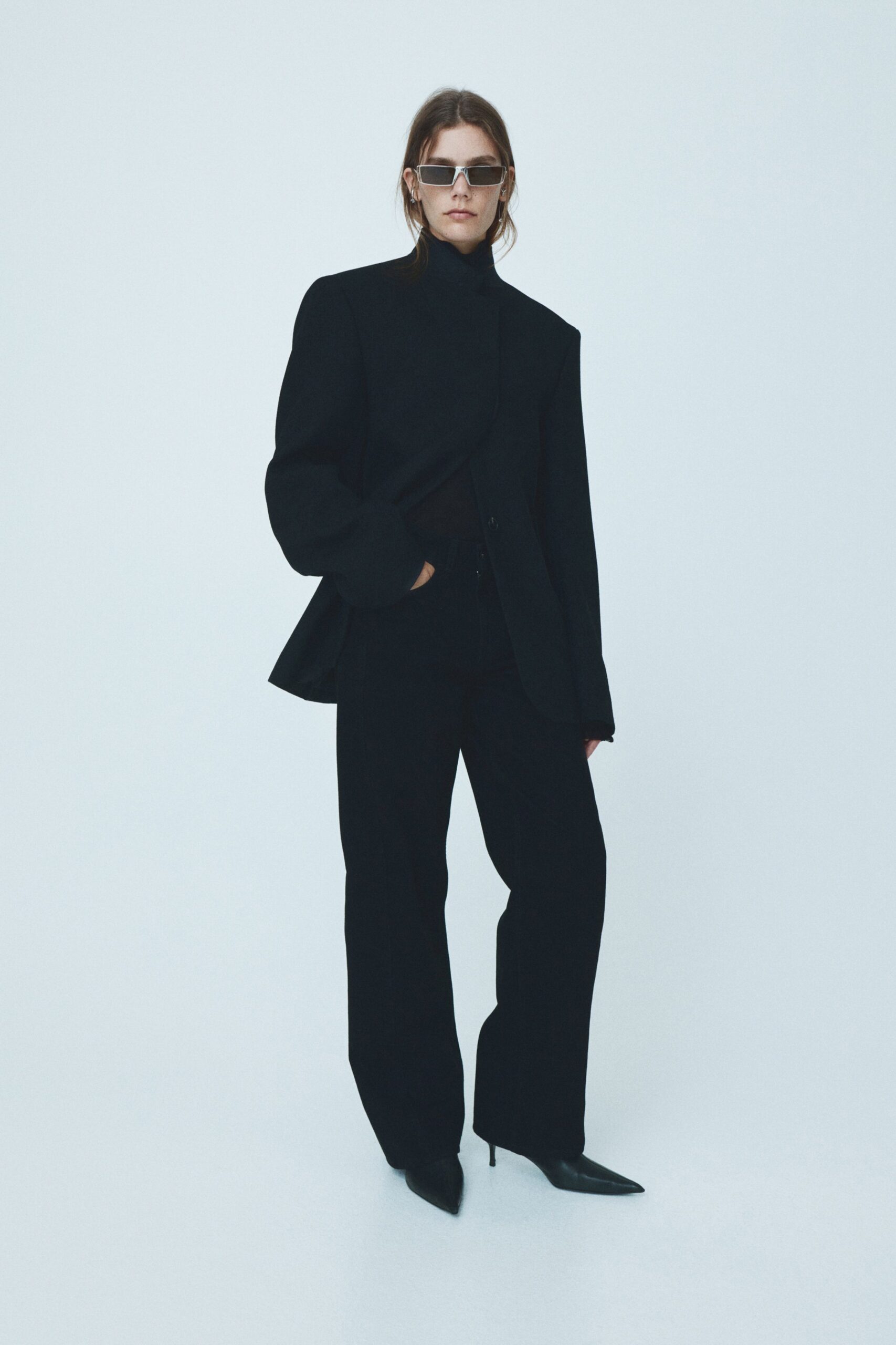 black structured blazer with relaxed pants