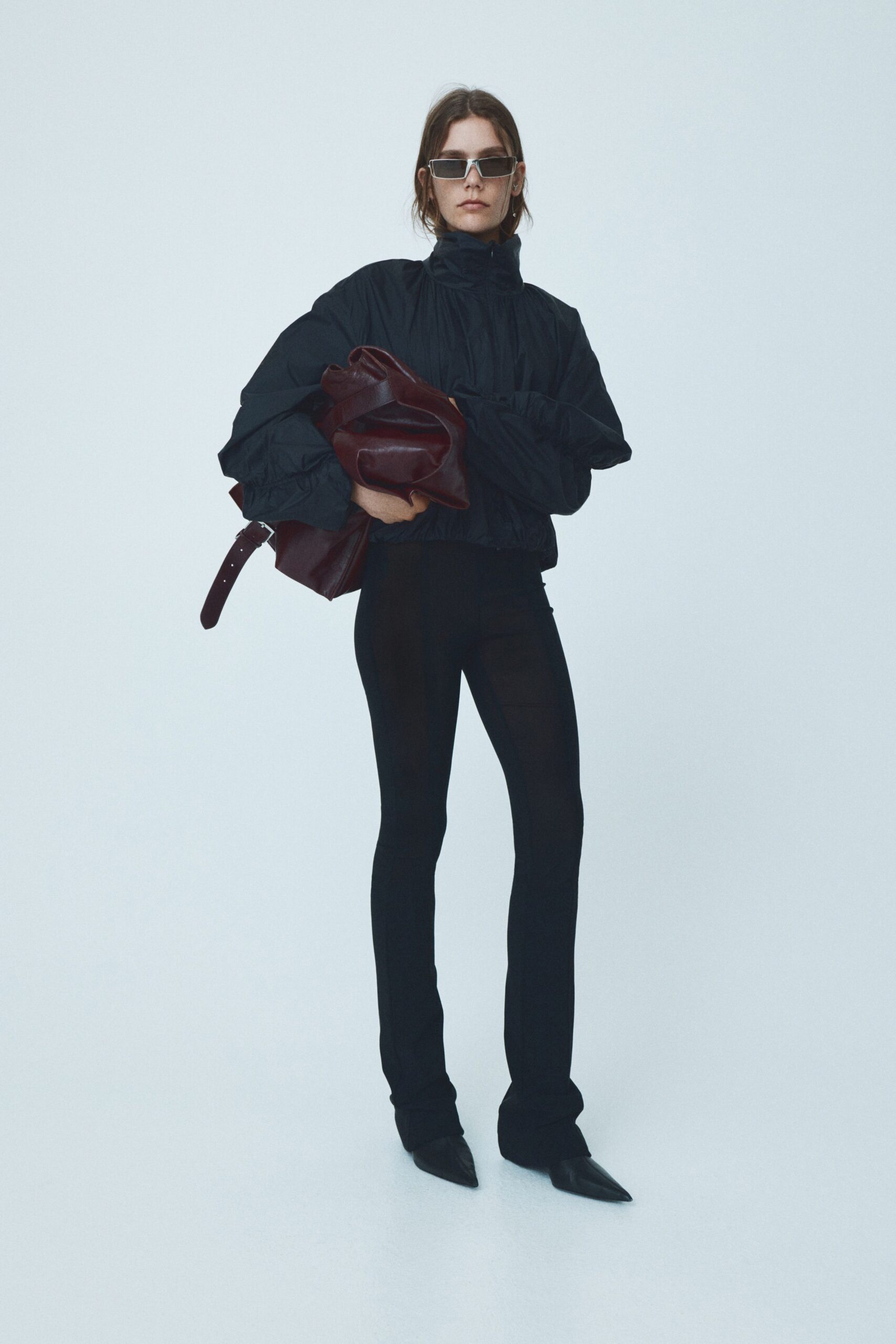 black cotton long-sleeve high-neck relaxed zippered jacket