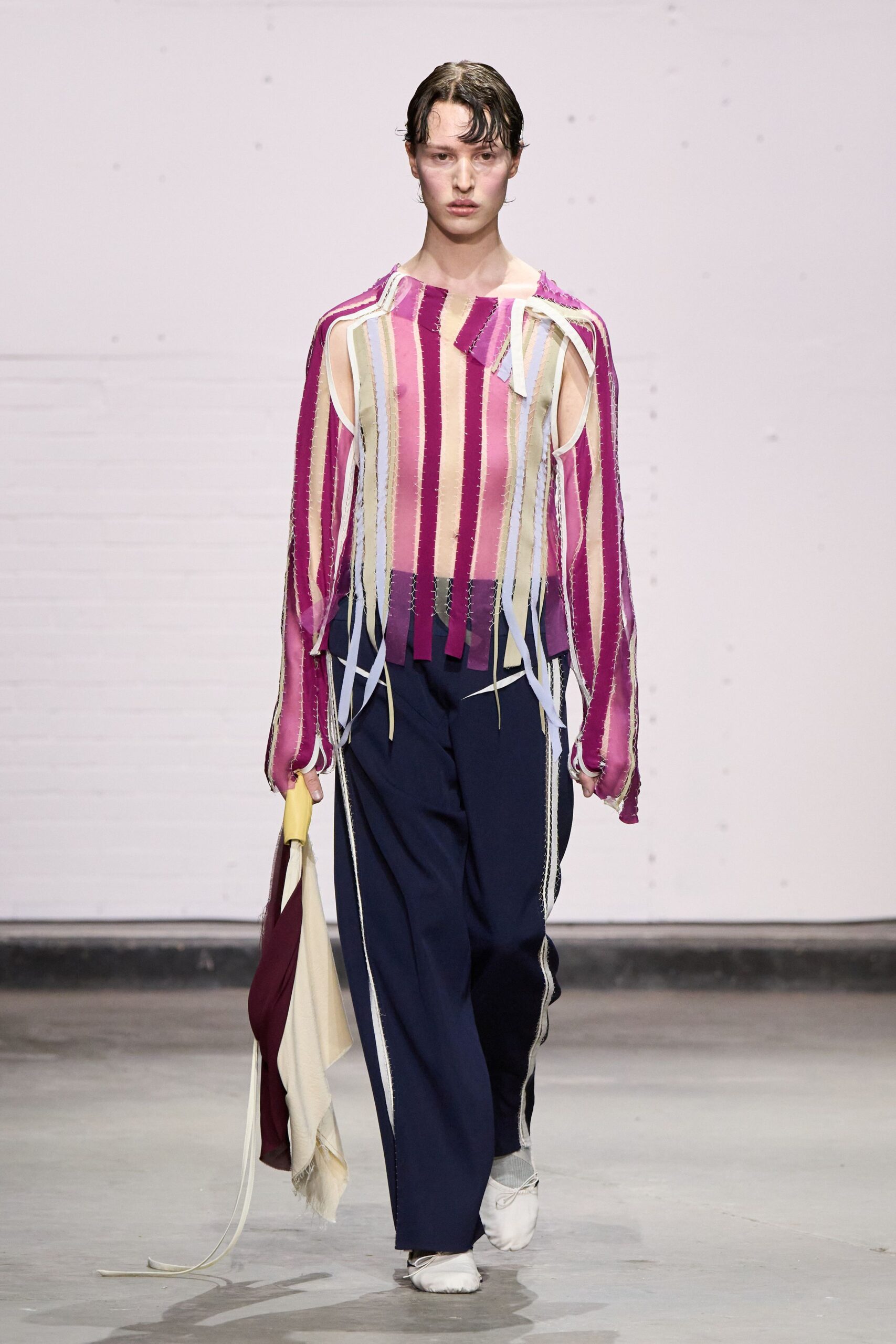 pink striped relaxed top with navy pants