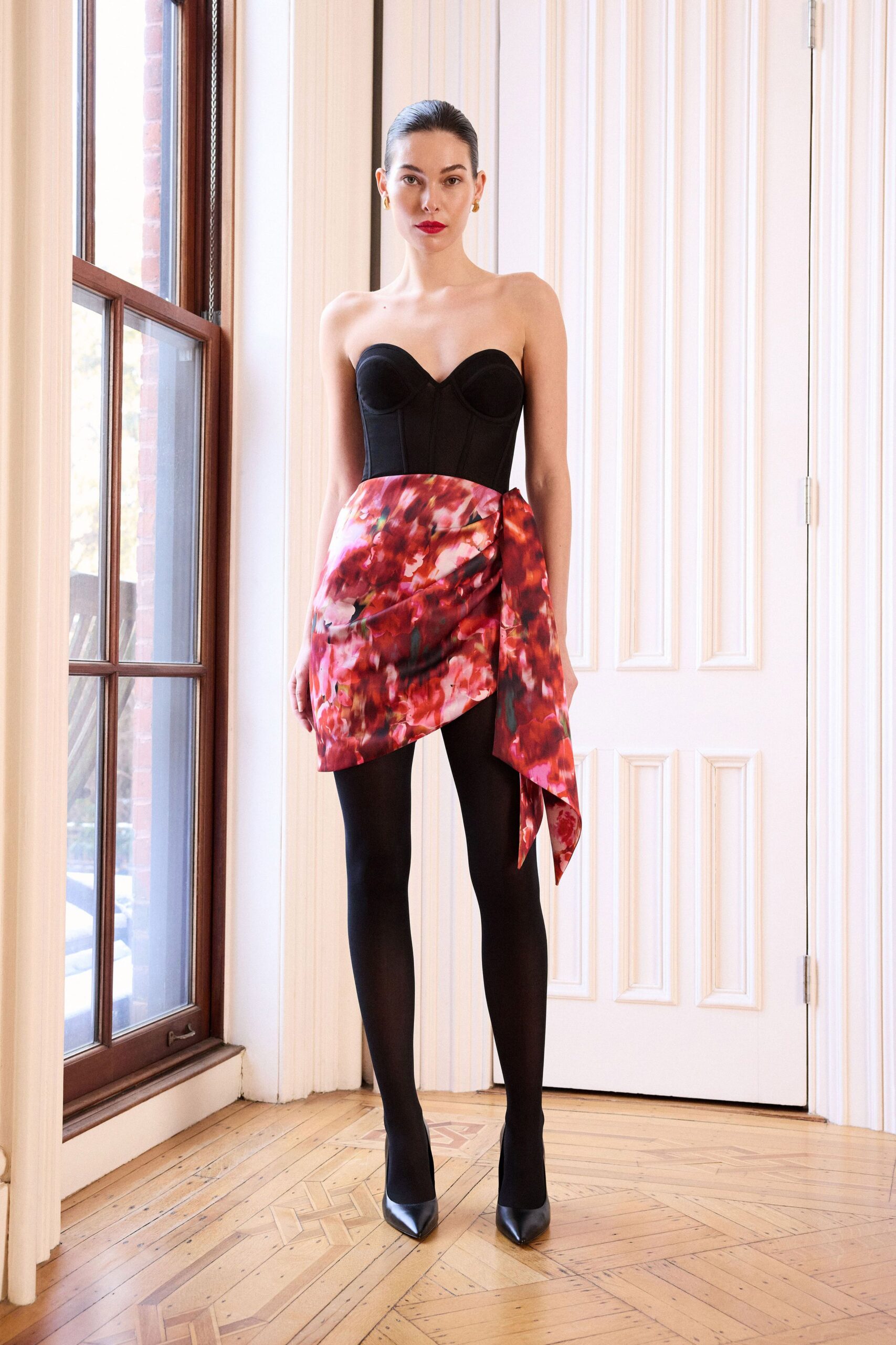 black bustier red asymmetric skirt