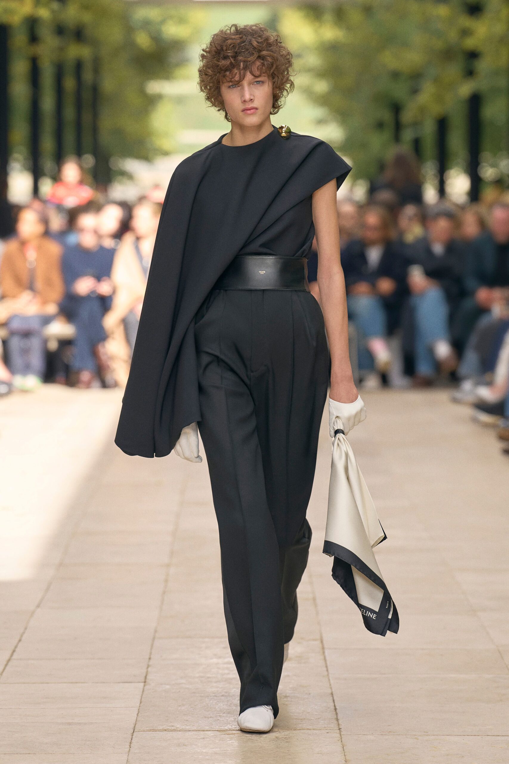 black fitted top and tailored pants