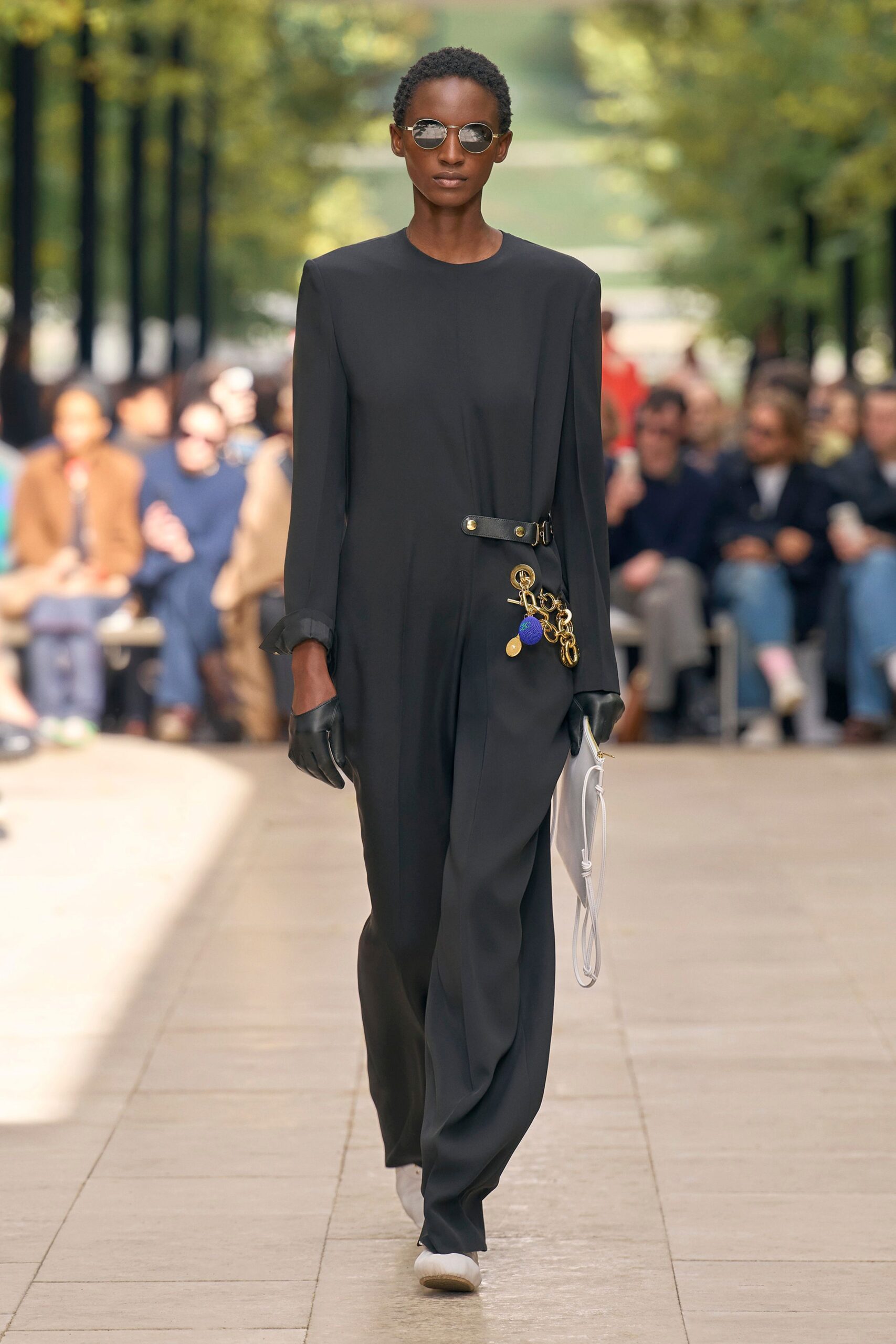 black fitted jumpsuit with accessories