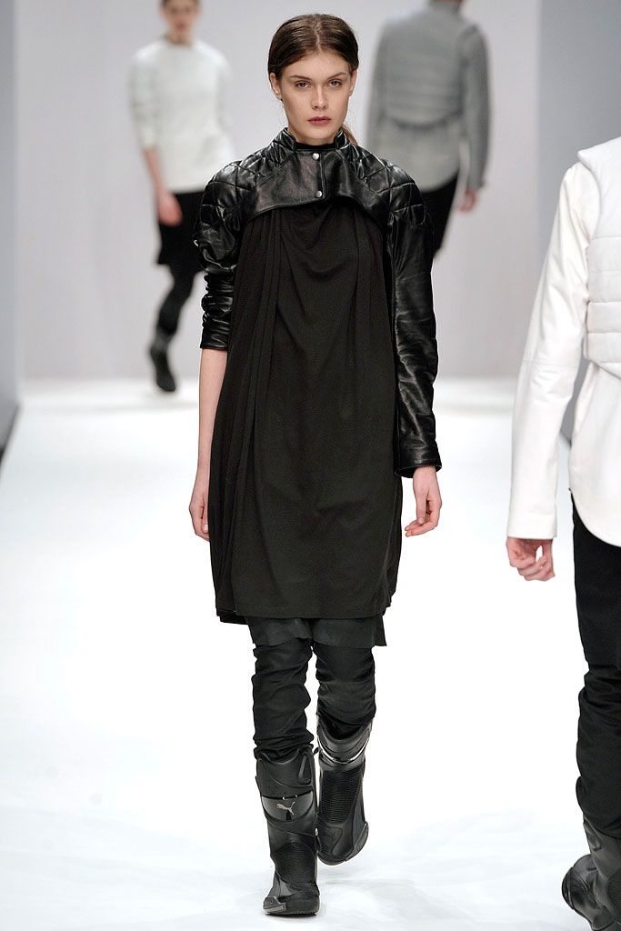 black leather long-sleeve high-neck structured quilted buttoned jacket