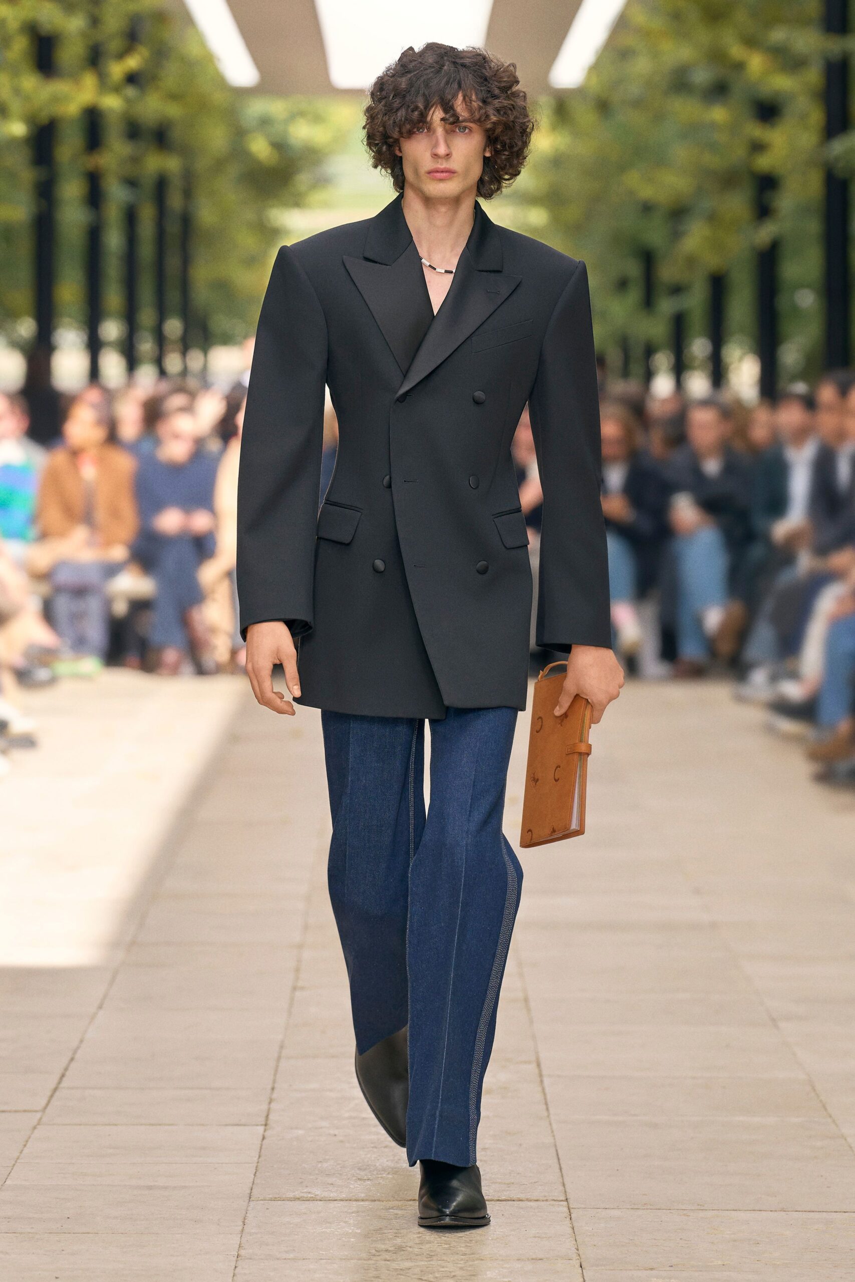 black blazer blue pants