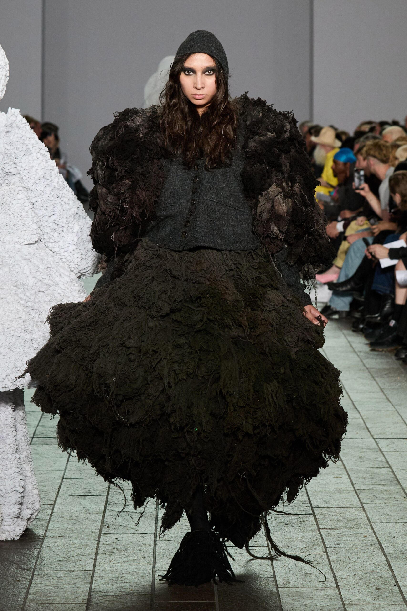 black wool long-sleeve collared oversized layered ruffled coat