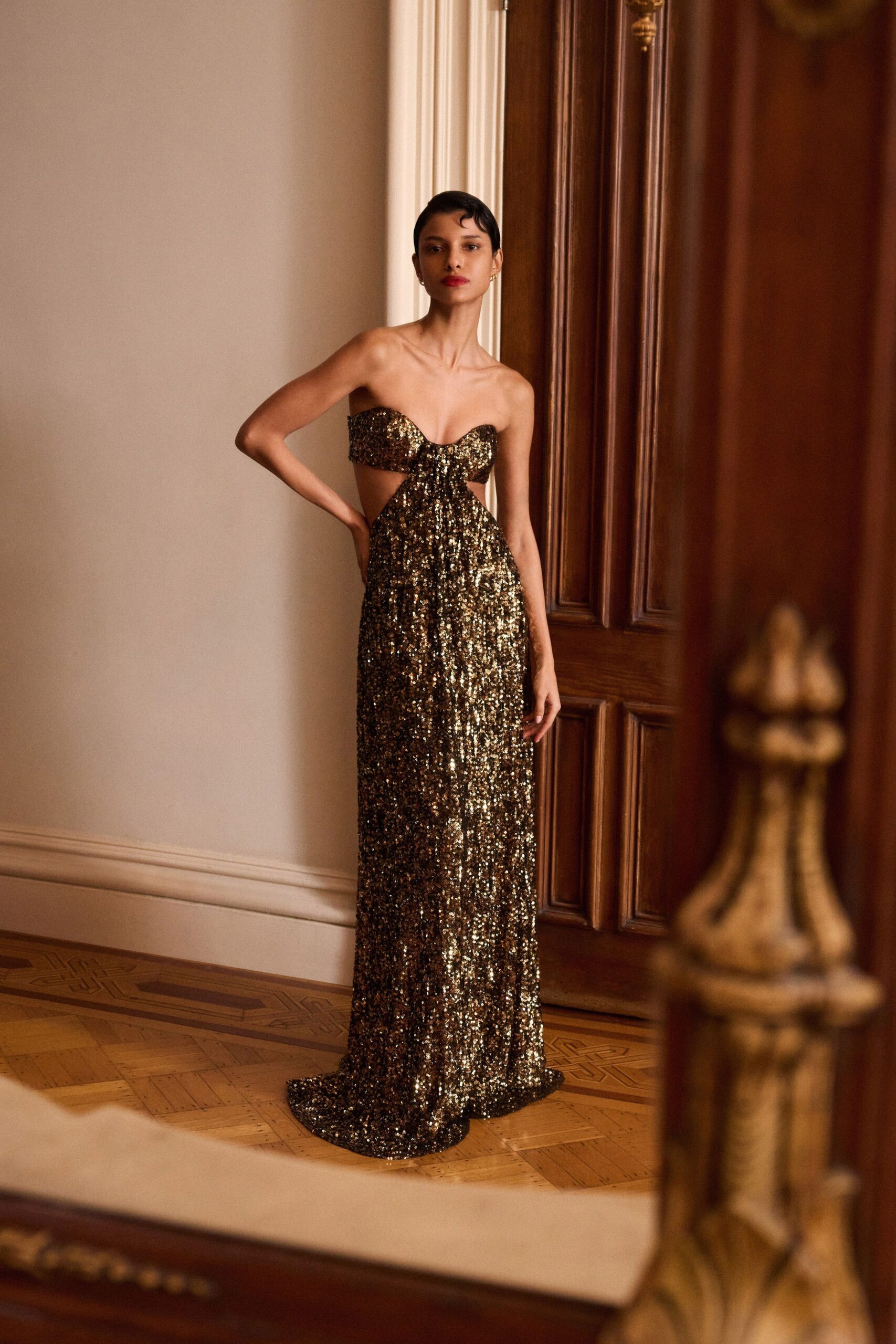 gold sequin strapless gown